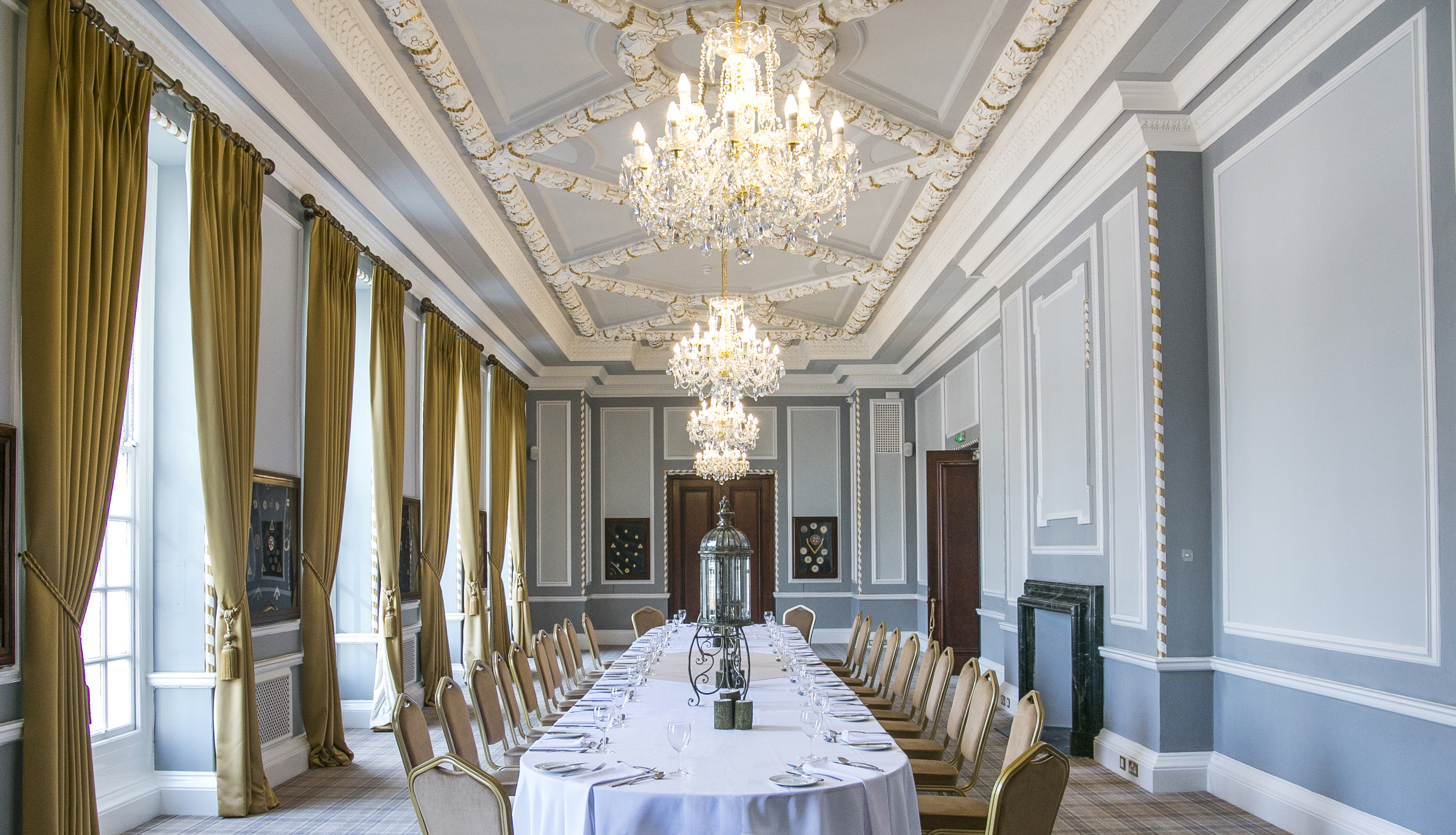 Elegant meeting room in Manchester Hall with a long table for corporate events.