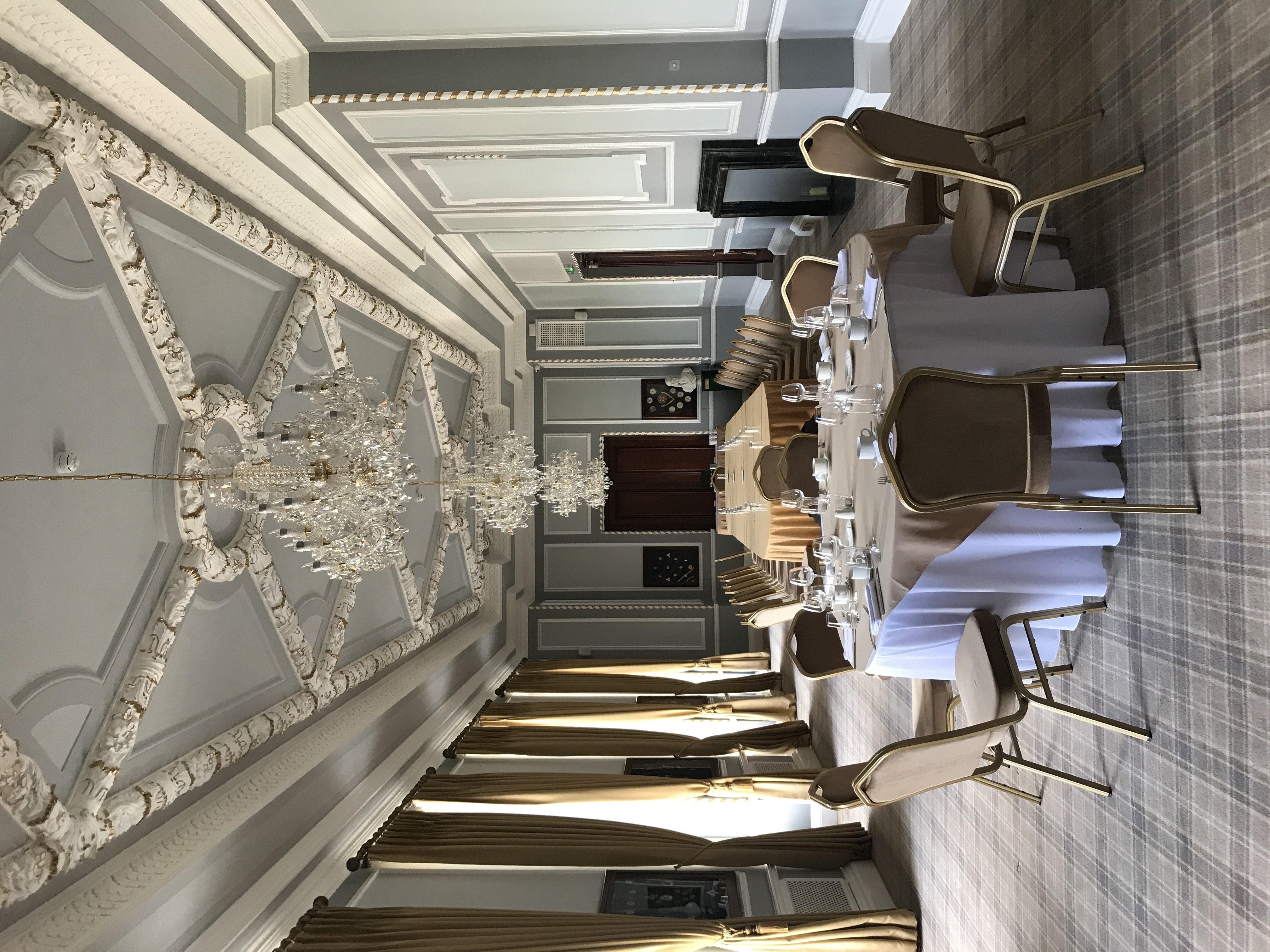 Elegant meeting space in Manchester Hall with long table, ideal for corporate events.