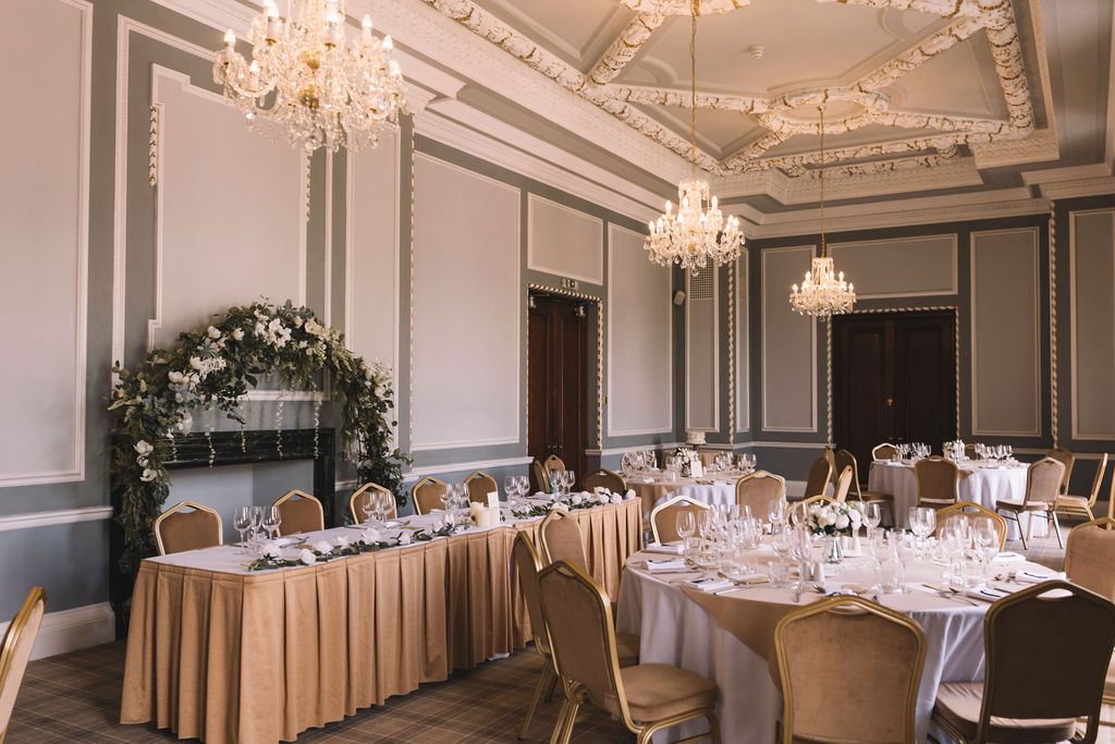 Elegant event space in Manchester Hall with chandeliers, perfect for weddings and corporate events.