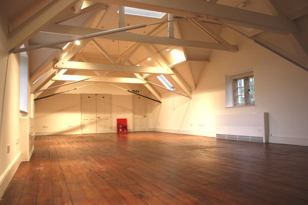 Spacious event space at The Stables, Aston Hall, perfect for meetings and workshops.