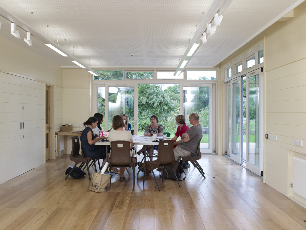 Collaborative meeting space with natural light, ideal for workshops in Weoley Castle.