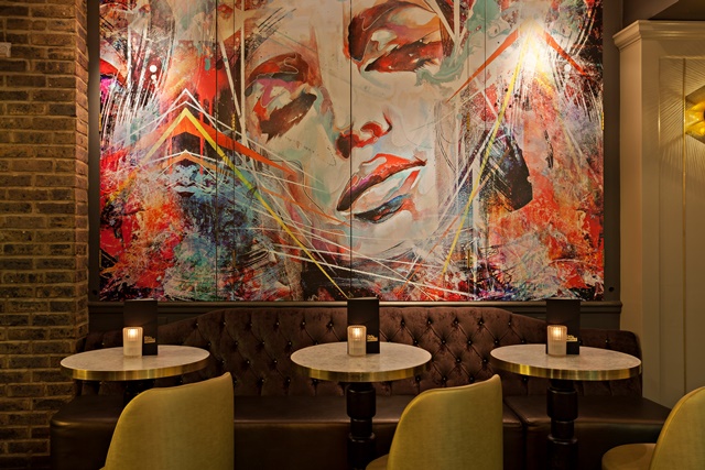 Whole VIP Area at Dirty Martini Bishopsgate with striking mural, ideal for cocktail receptions.
