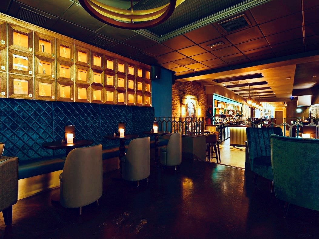 Blue Room at Dirty Martini St Paul's, plush seating for cocktail receptions and networking.