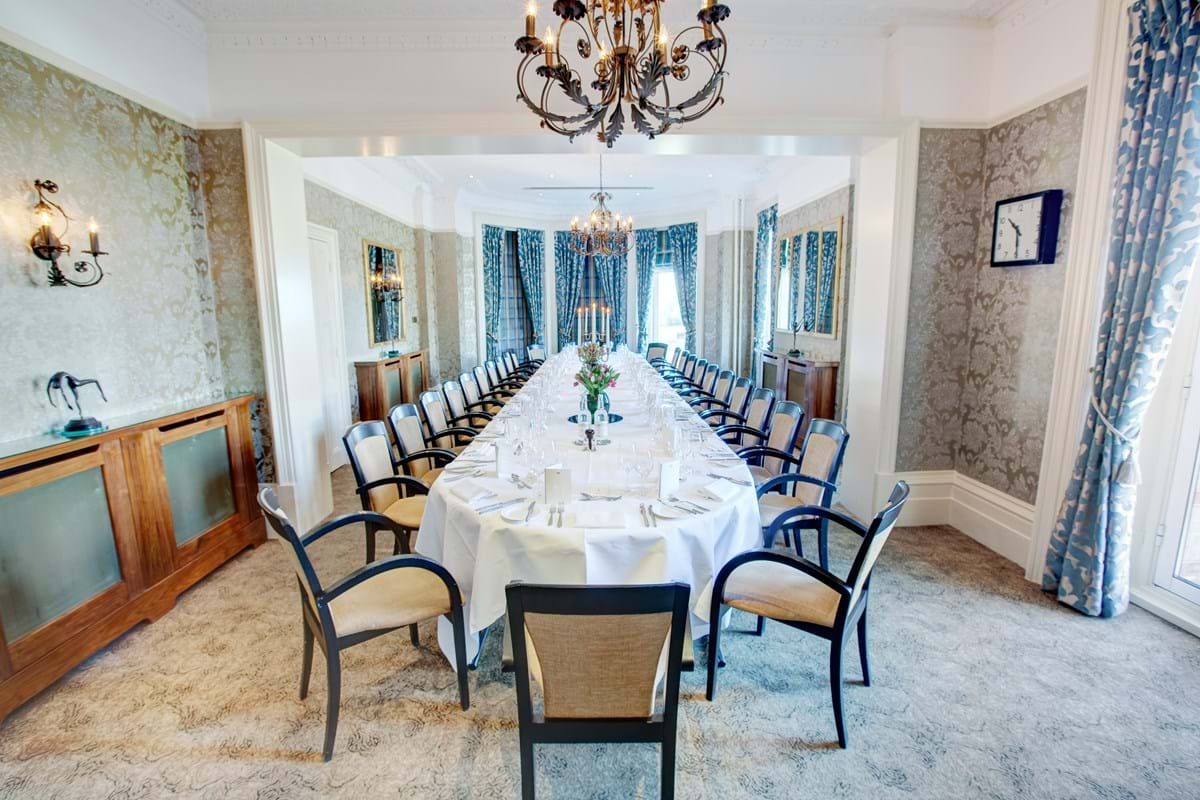 Elegant meeting room in The Petersham Hotel with chandelier, ideal for corporate events.