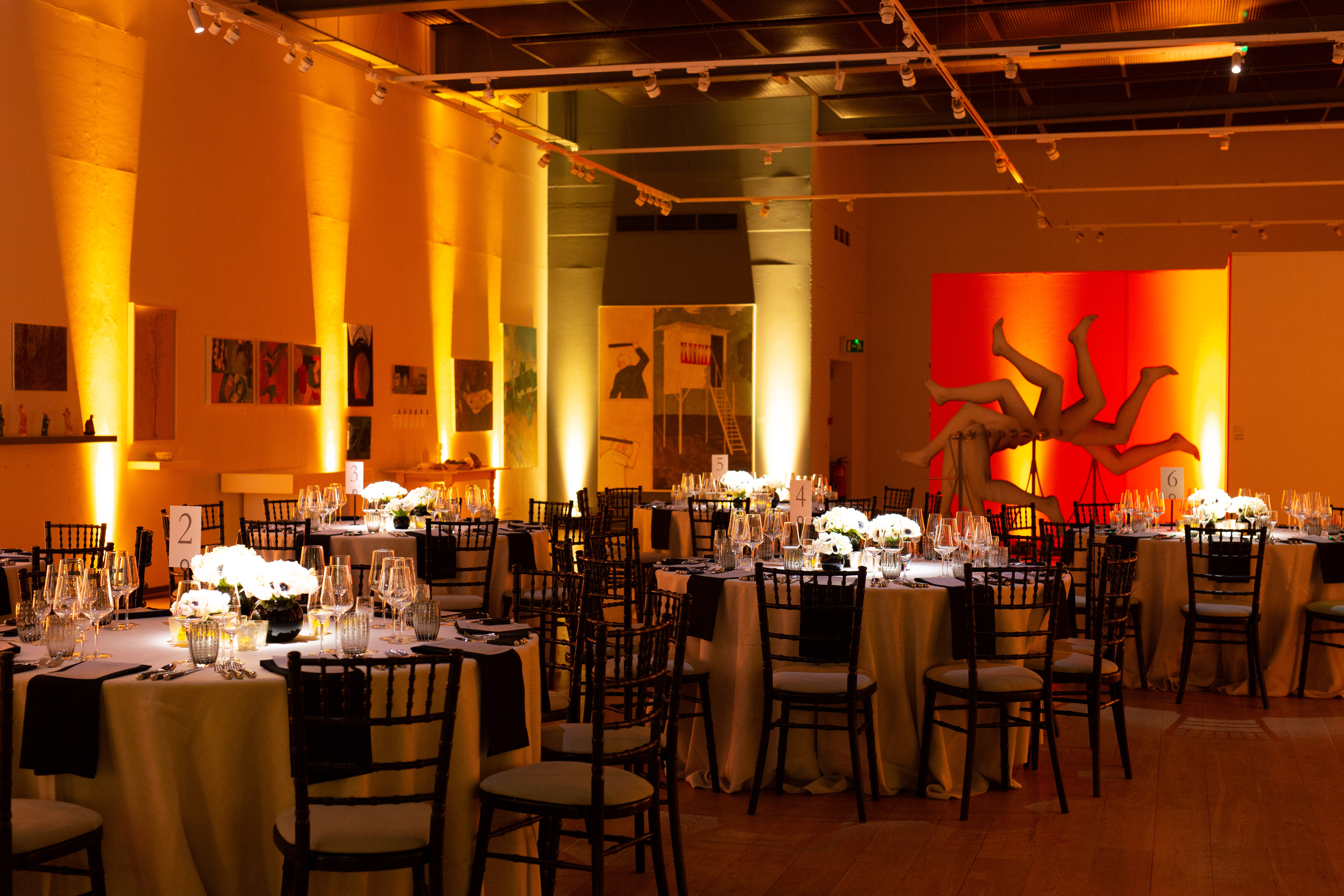 Elegant event space with round tables, ideal for gala or formal dinner at Mall Galleries.