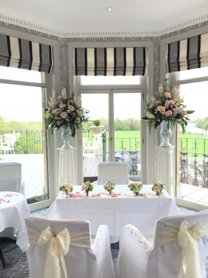 Elegant River Room at The Petersham Hotel, perfect for weddings and events with floral decor.
