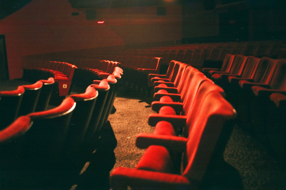 Intimate Rio Cinema auditorium with red velvet seating for engaging performances.