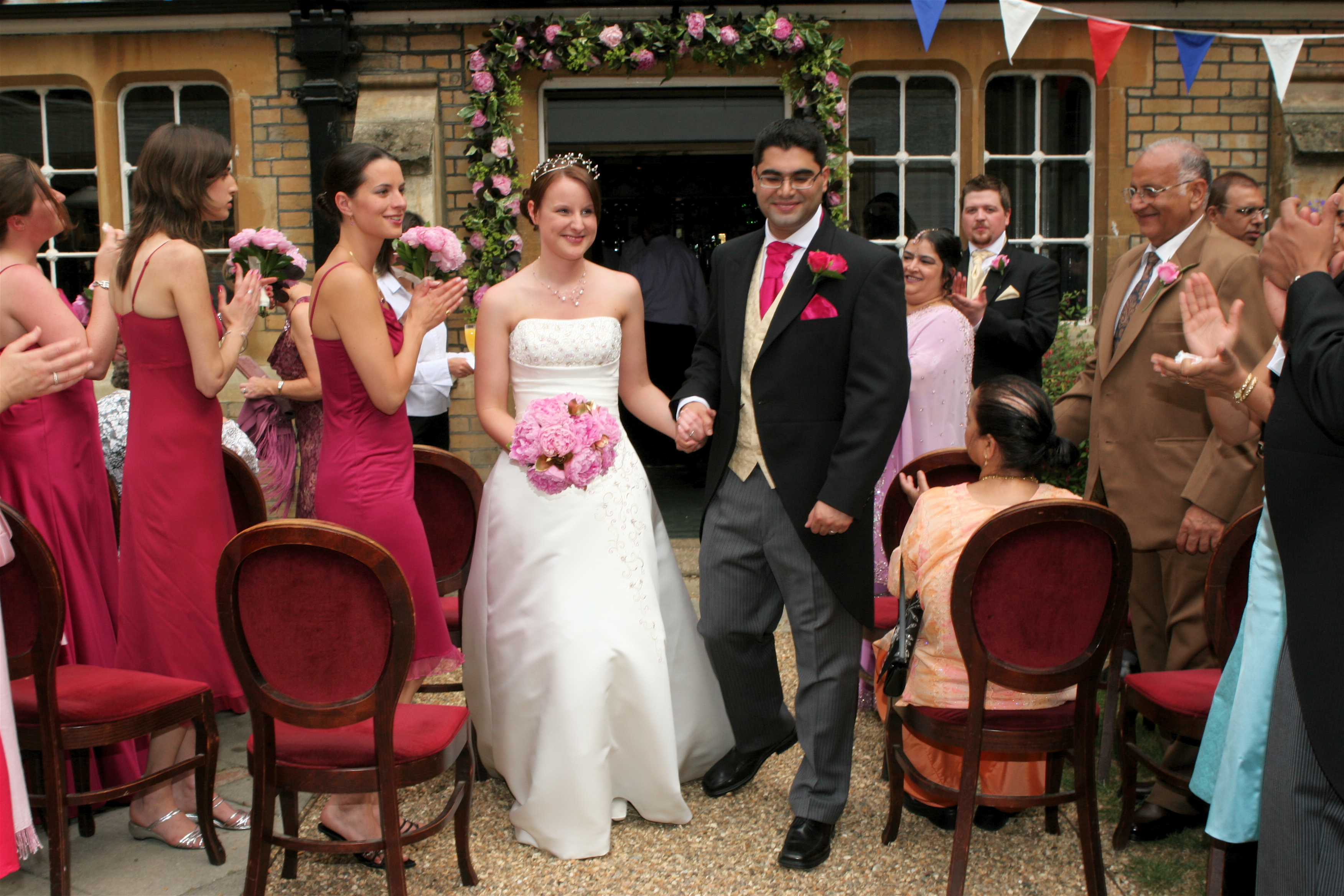 Gothic Bar wedding ceremony with vibrant decor and joyful guests celebrating love.