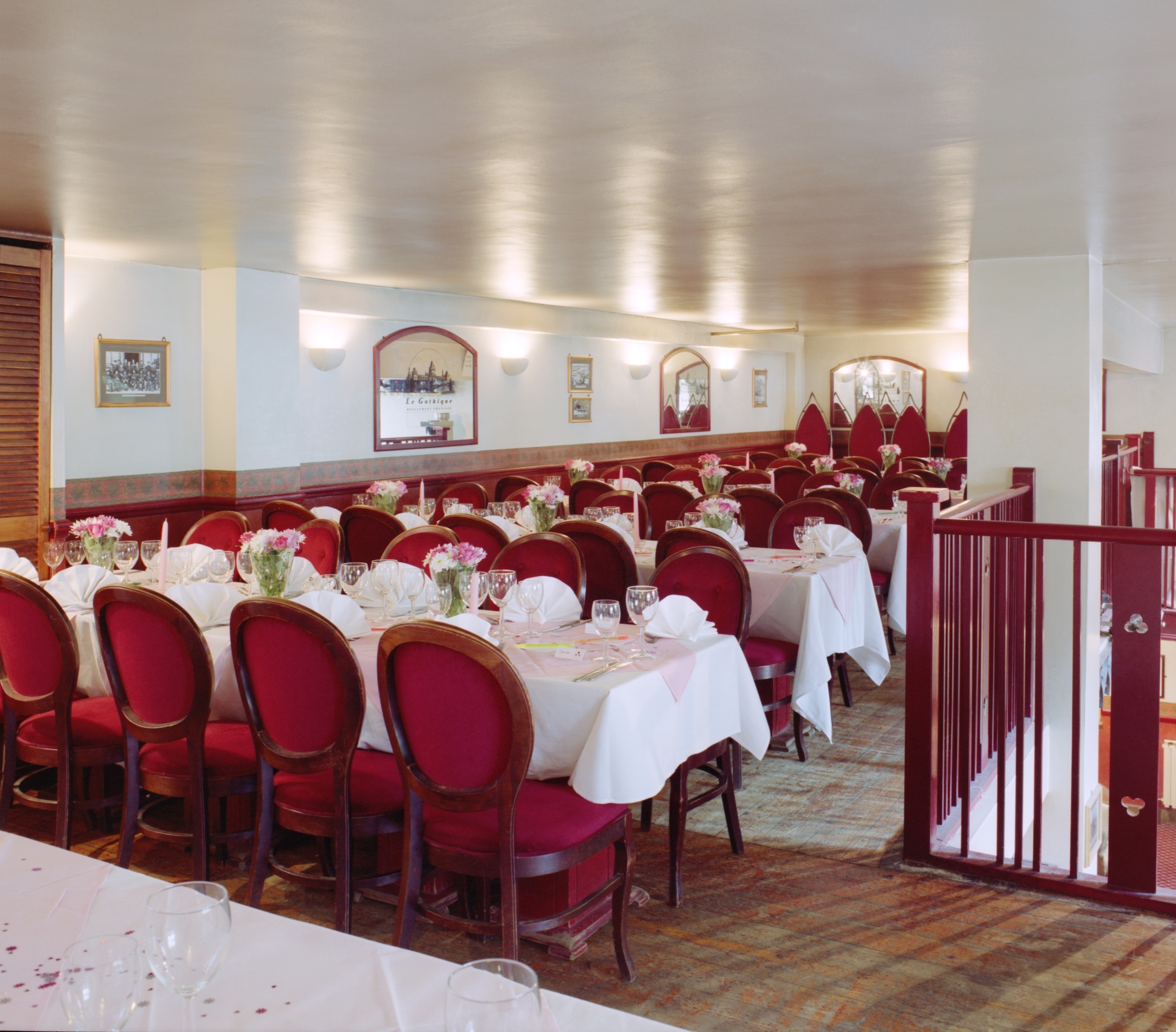 Gothic Bar & Restaurant dining space with elegant table settings for corporate events and banquets.