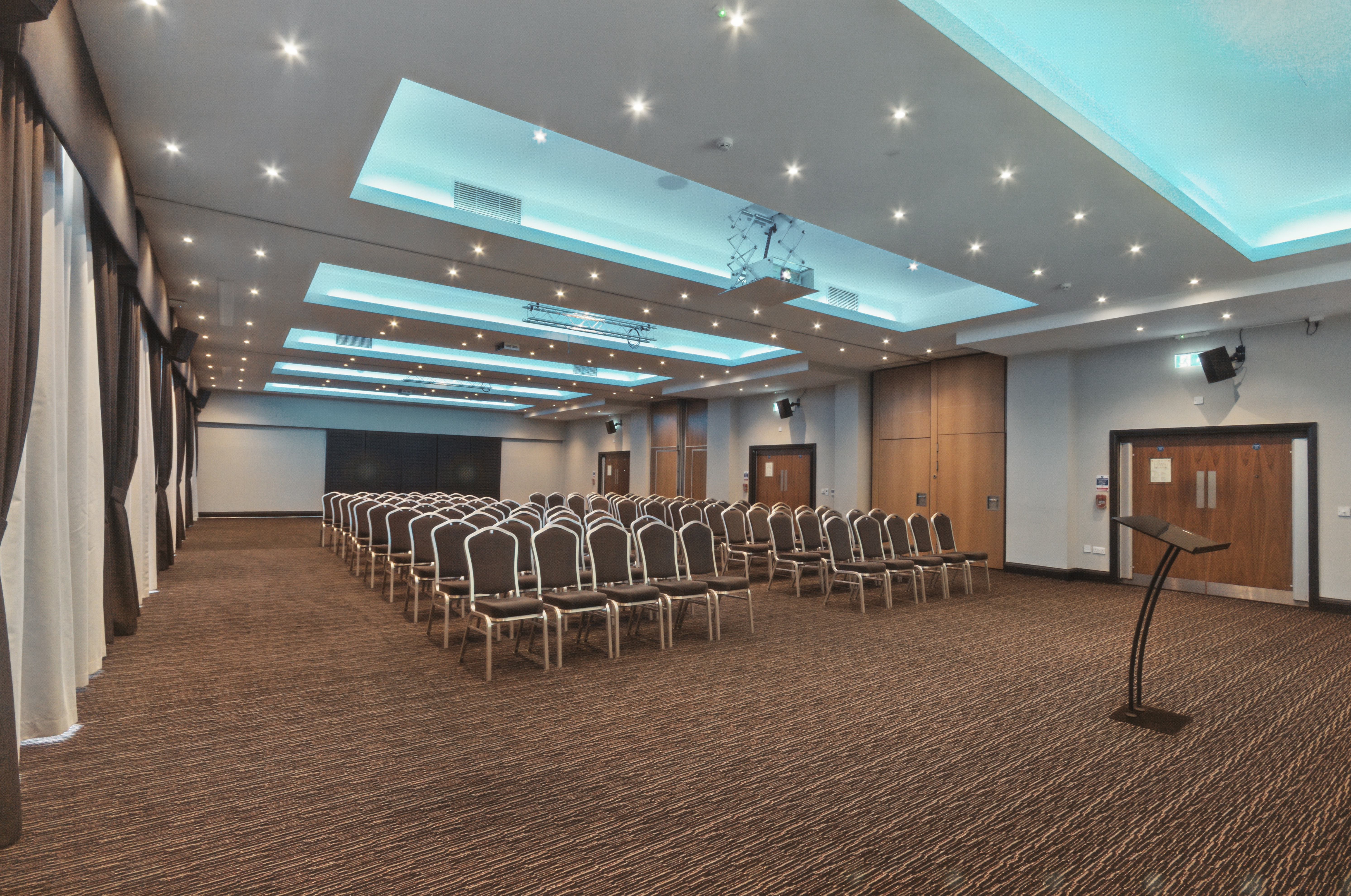 Serengeti Suite conference room with elegant chairs for corporate meetings and events.