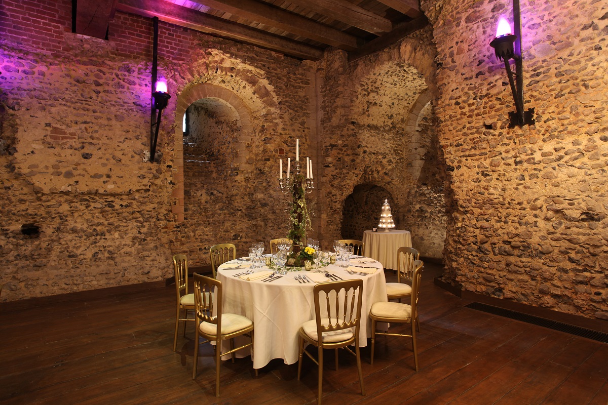 Tapestry Floor at Hedingham Castle: elegant dining setup for weddings and events.