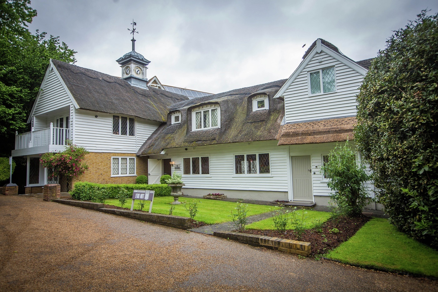 Cottage Suite at Rowhill Grange: thatched roof venue for corporate retreats and events.