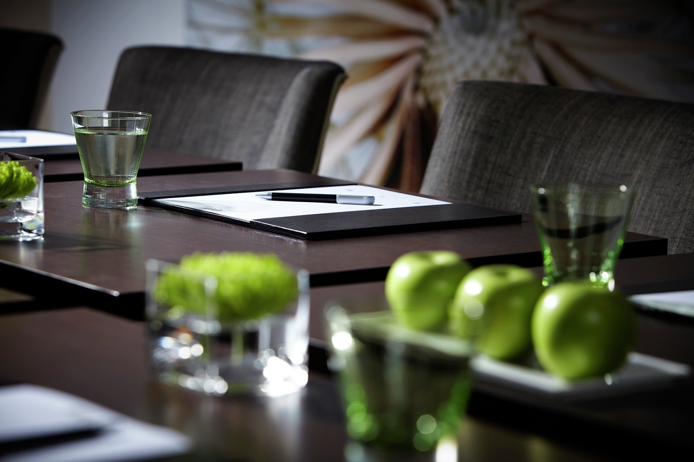 Boardroom setup at Rowhill Grange Hotel with sleek tables for corporate events.