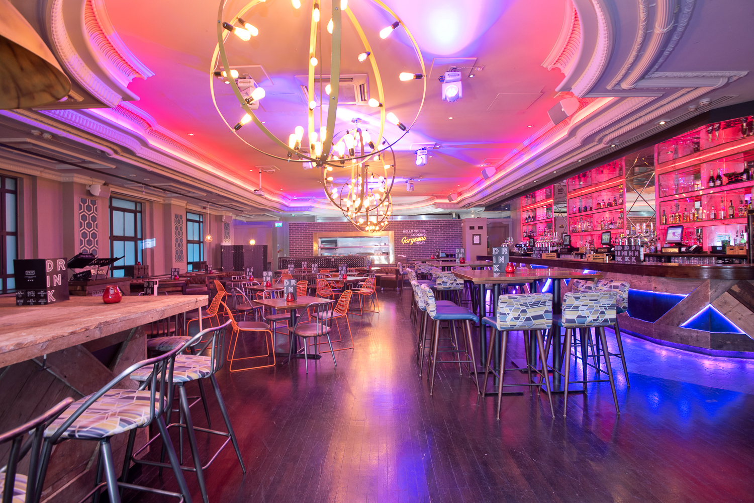 Vibrant event space in Sway with modern decor, ideal for networking and gatherings.