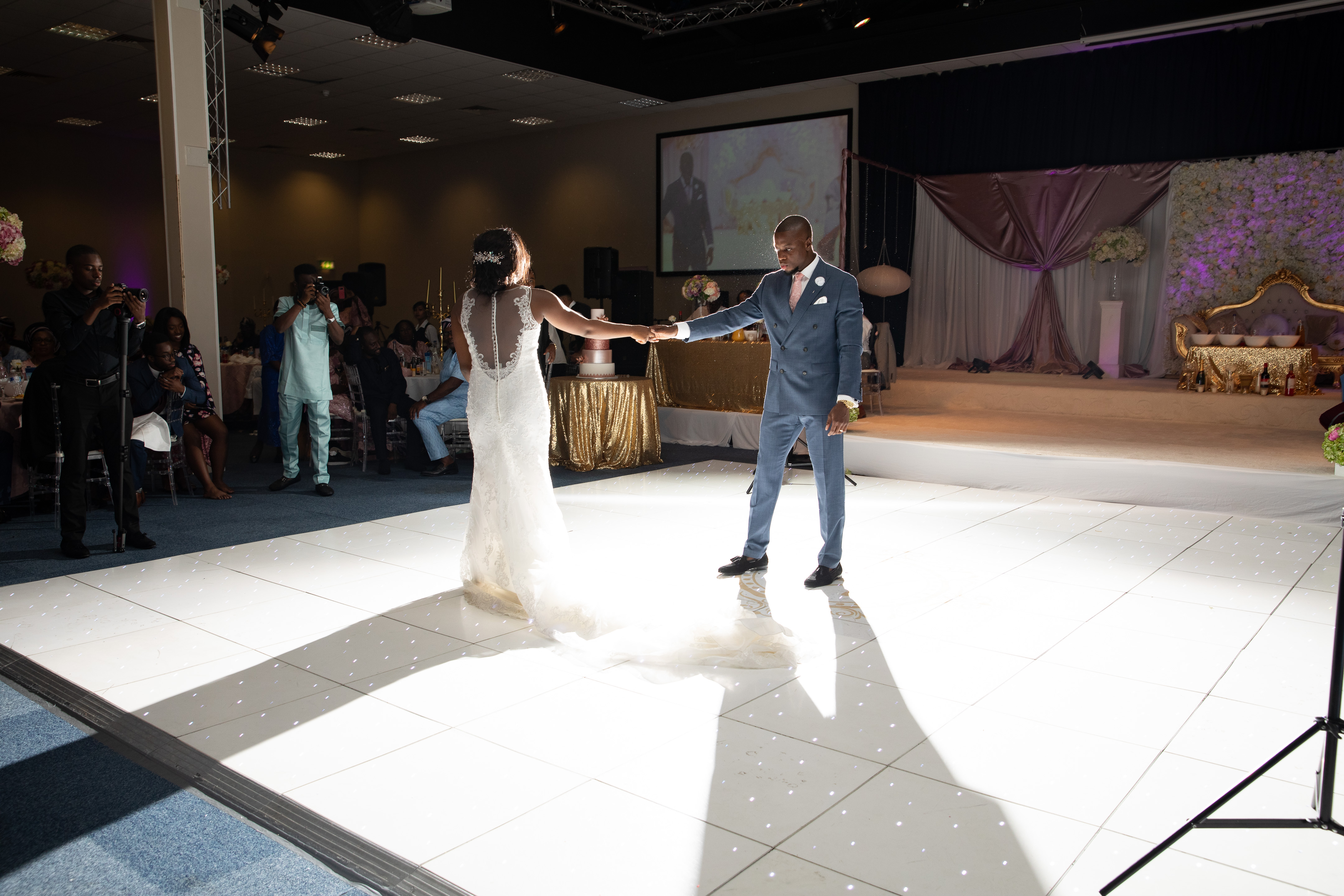 Thames Hall wedding reception with elegant dance floor and romantic decor in Oxford.