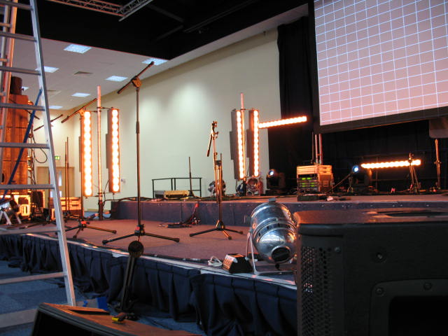 Thames Hall stage setup with professional lighting for event production in Oxford.