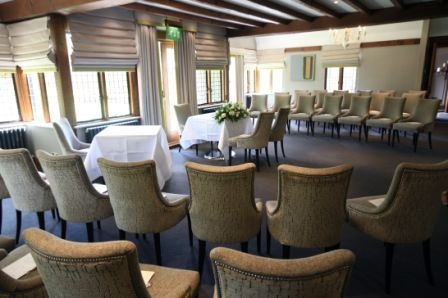 Intimate meeting room at Langshott Manor Hotel, perfect for workshops and conferences.