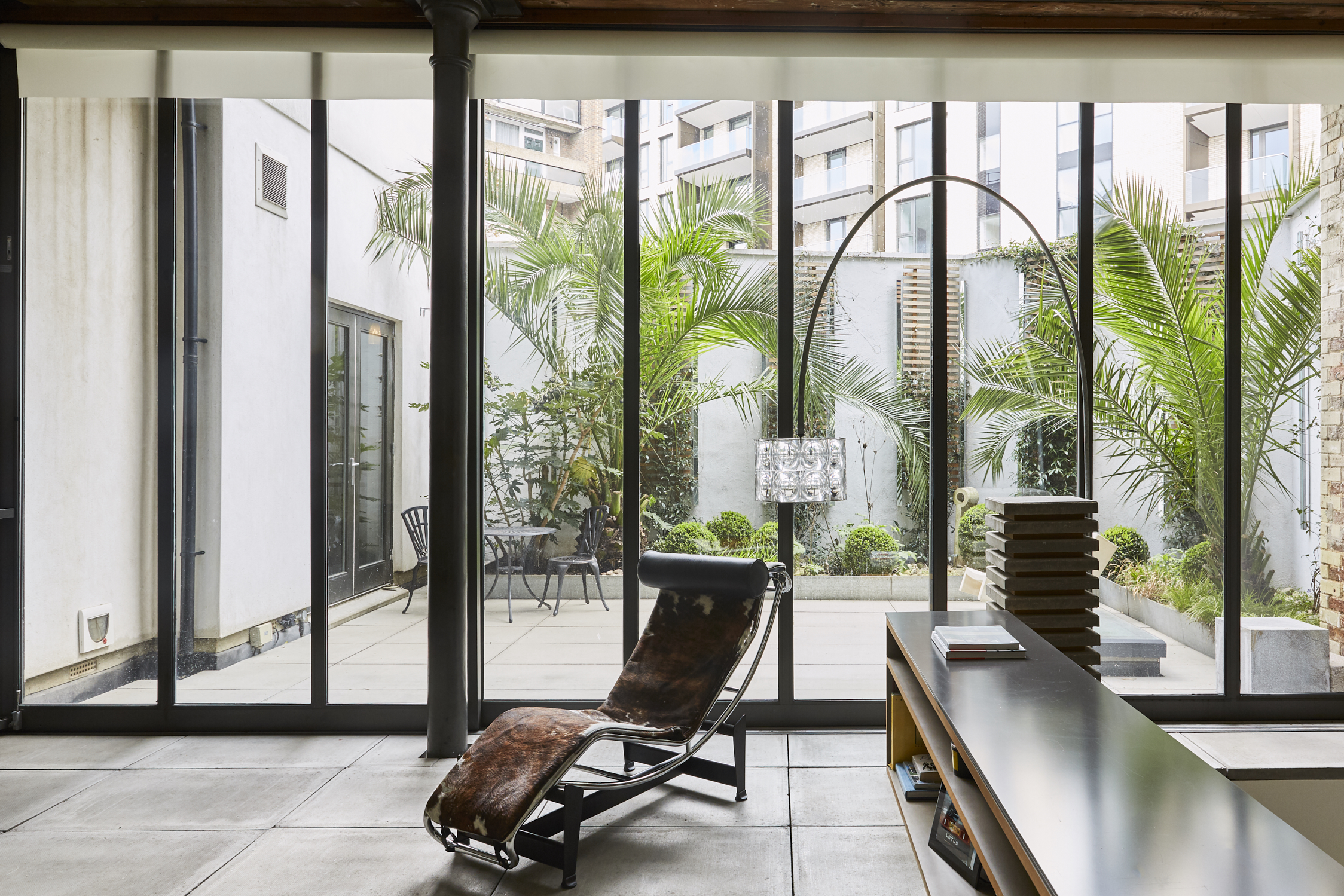 Modern meeting space in Dingley, Sizona with large windows and greenery for events.