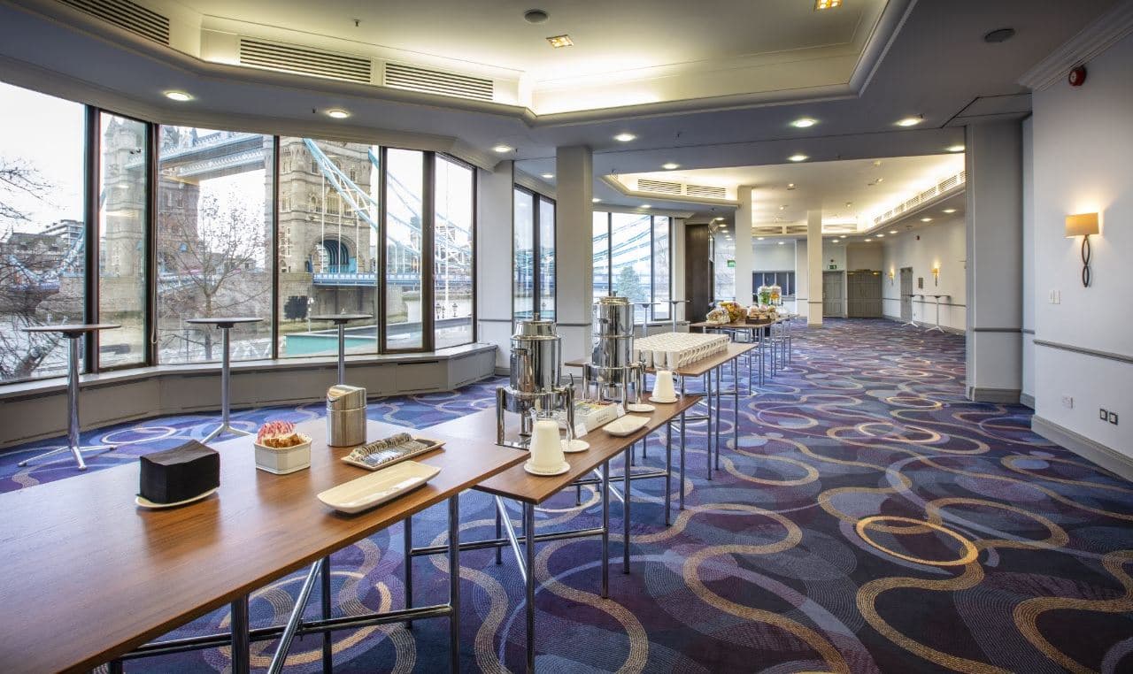 Tower Suite event space with natural light, ideal for networking and conferences.