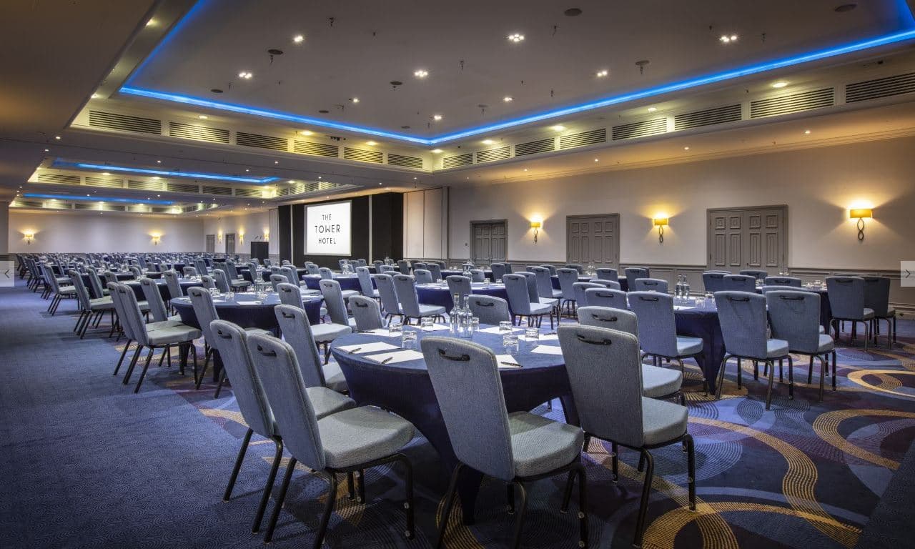 Spacious Tower Suite conference room ready for corporate events and presentations.