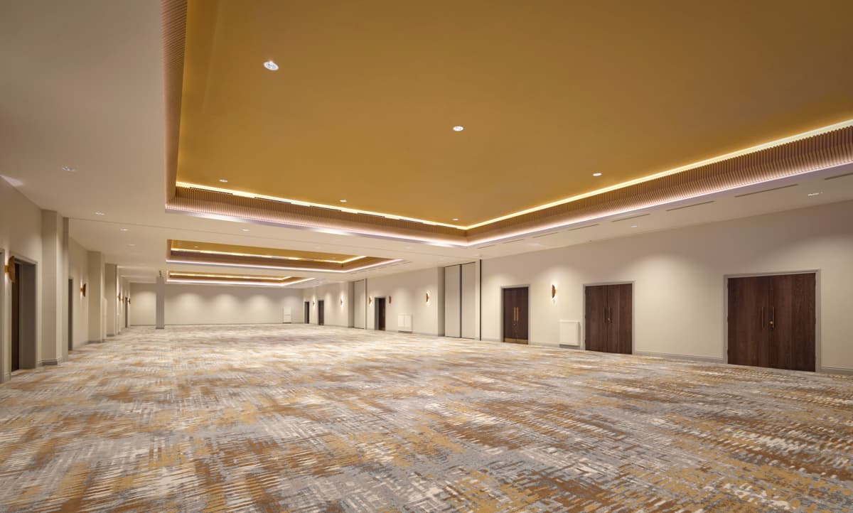 Modern Tower Suite ballroom, a versatile blank canvas for wedding and corporate event planning.