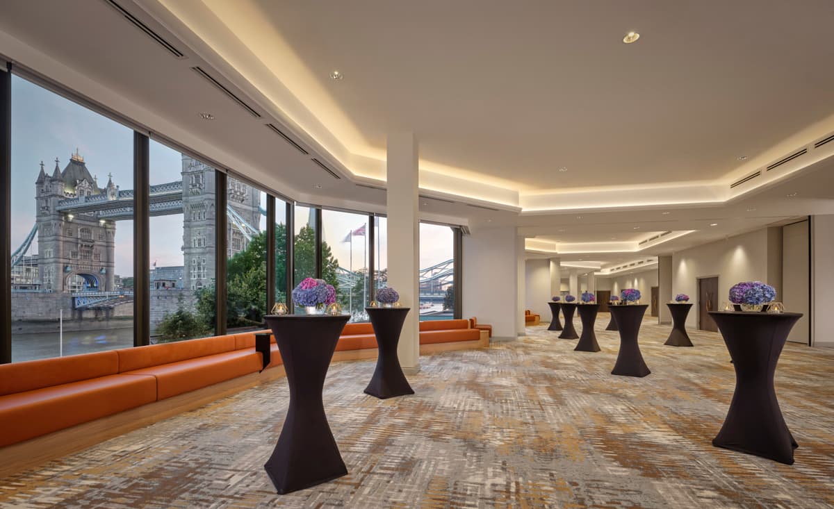 Tower Suite cocktail reception with floor-to-ceiling windows for luxury corporate events.