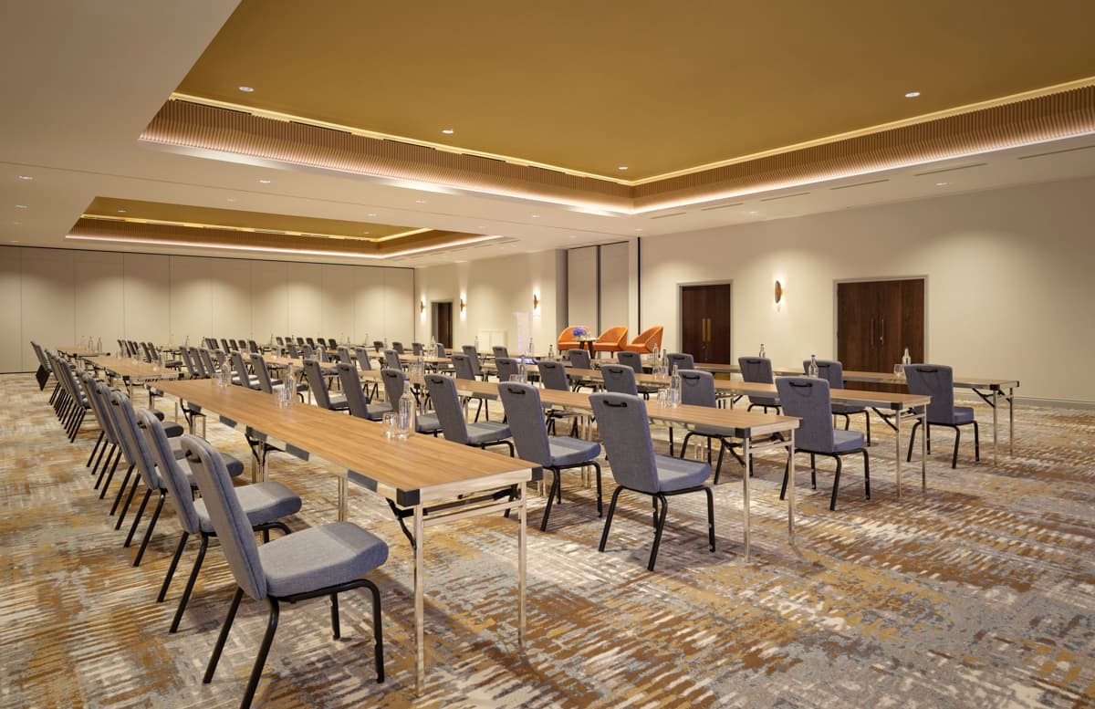 Tower Suite ballroom in classroom setup for corporate training and educational sessions.