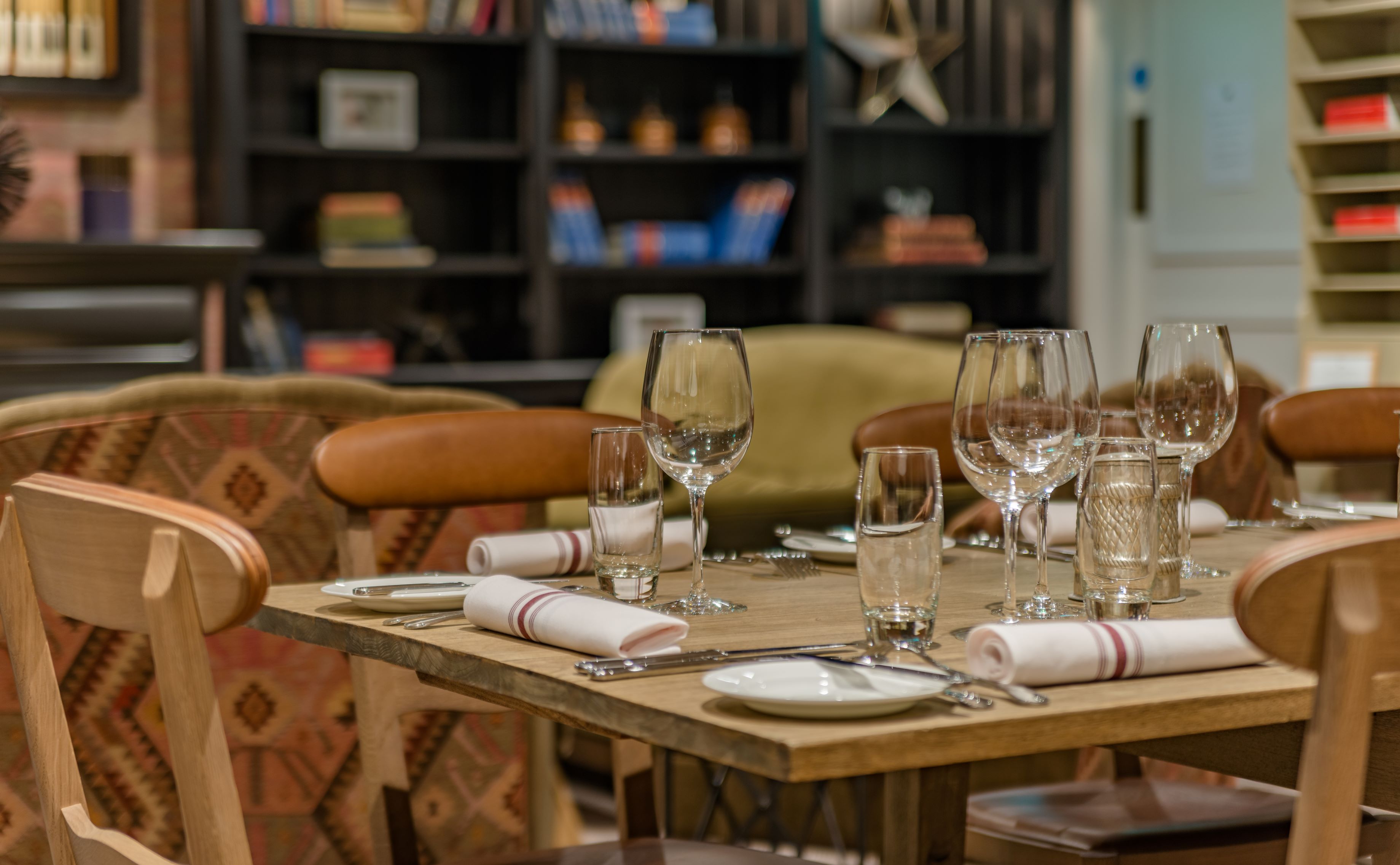 Elegant dining table in The Mezzanine Lounge for intimate gatherings and corporate events.