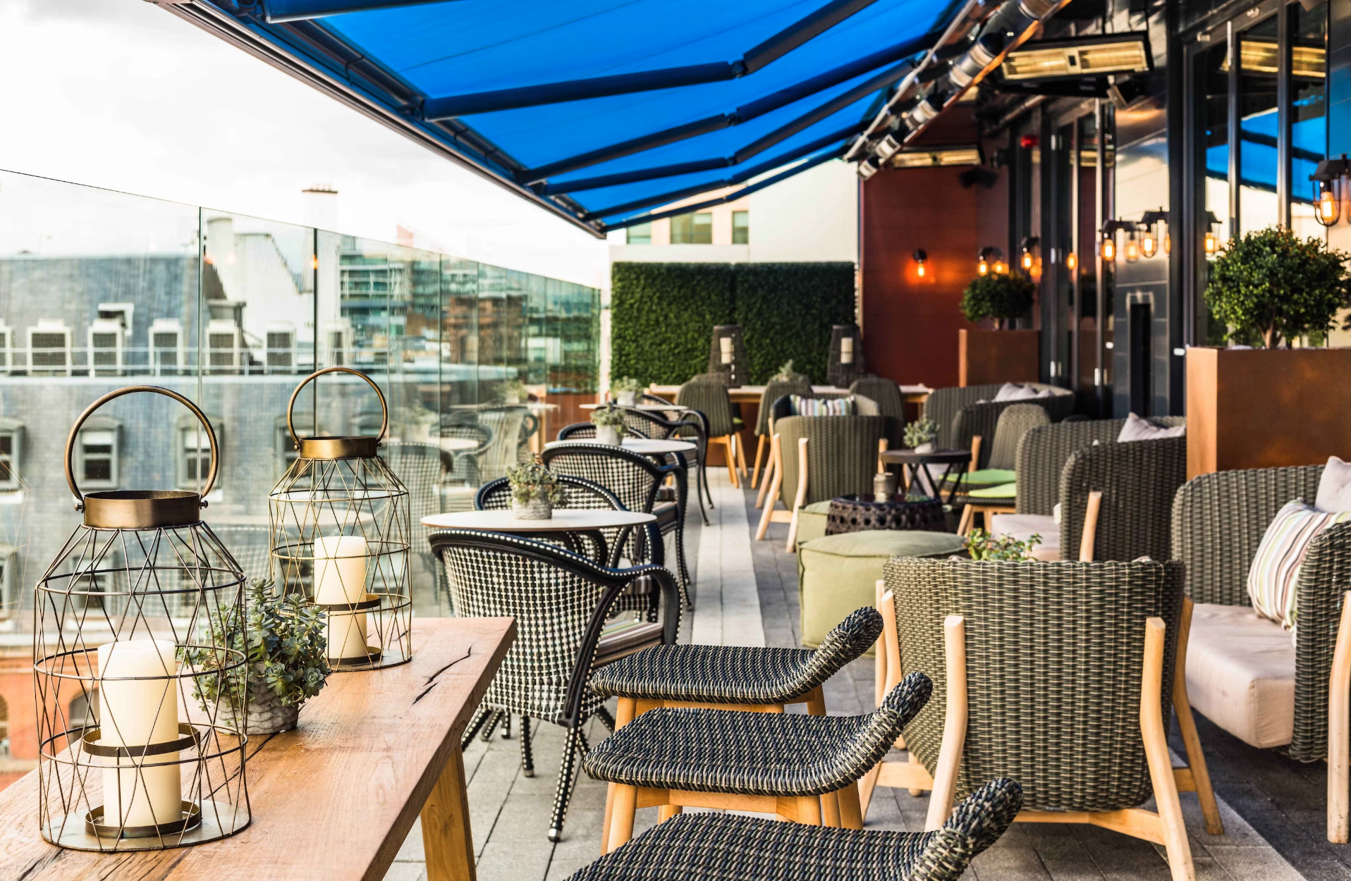 Stylish rooftop venue with blue canopy for events at King Street Townhouse.