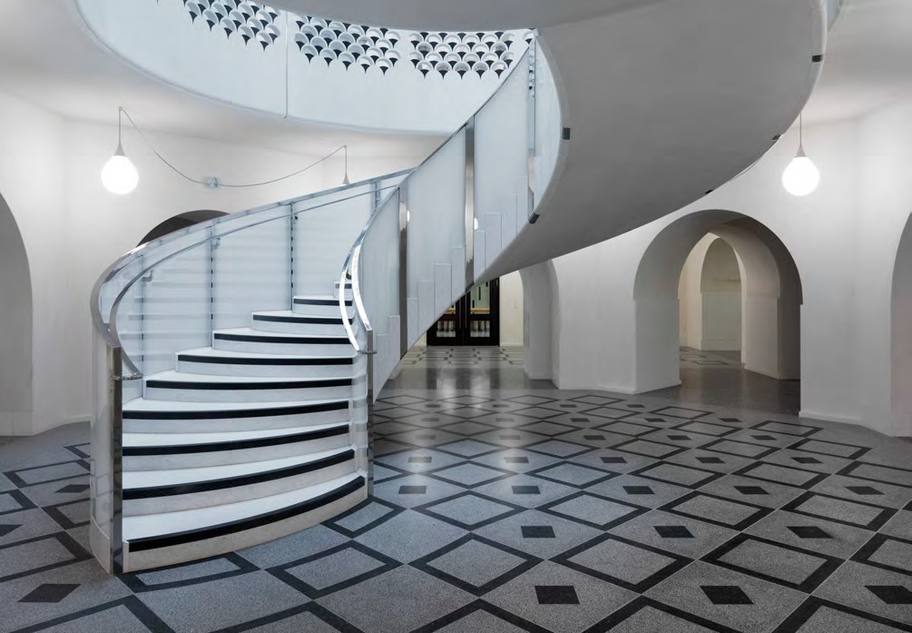 Djanogly Cafe staircase at Tate Britain, modern design for elegant events and gatherings.