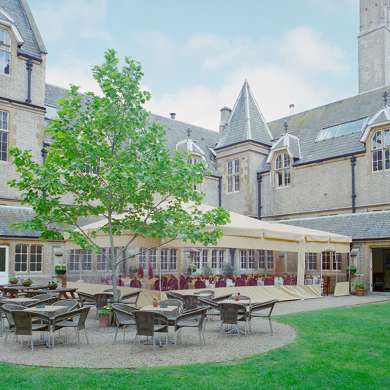 Charming outdoor event space with marquee at Le Gothique, ideal for weddings and gatherings.