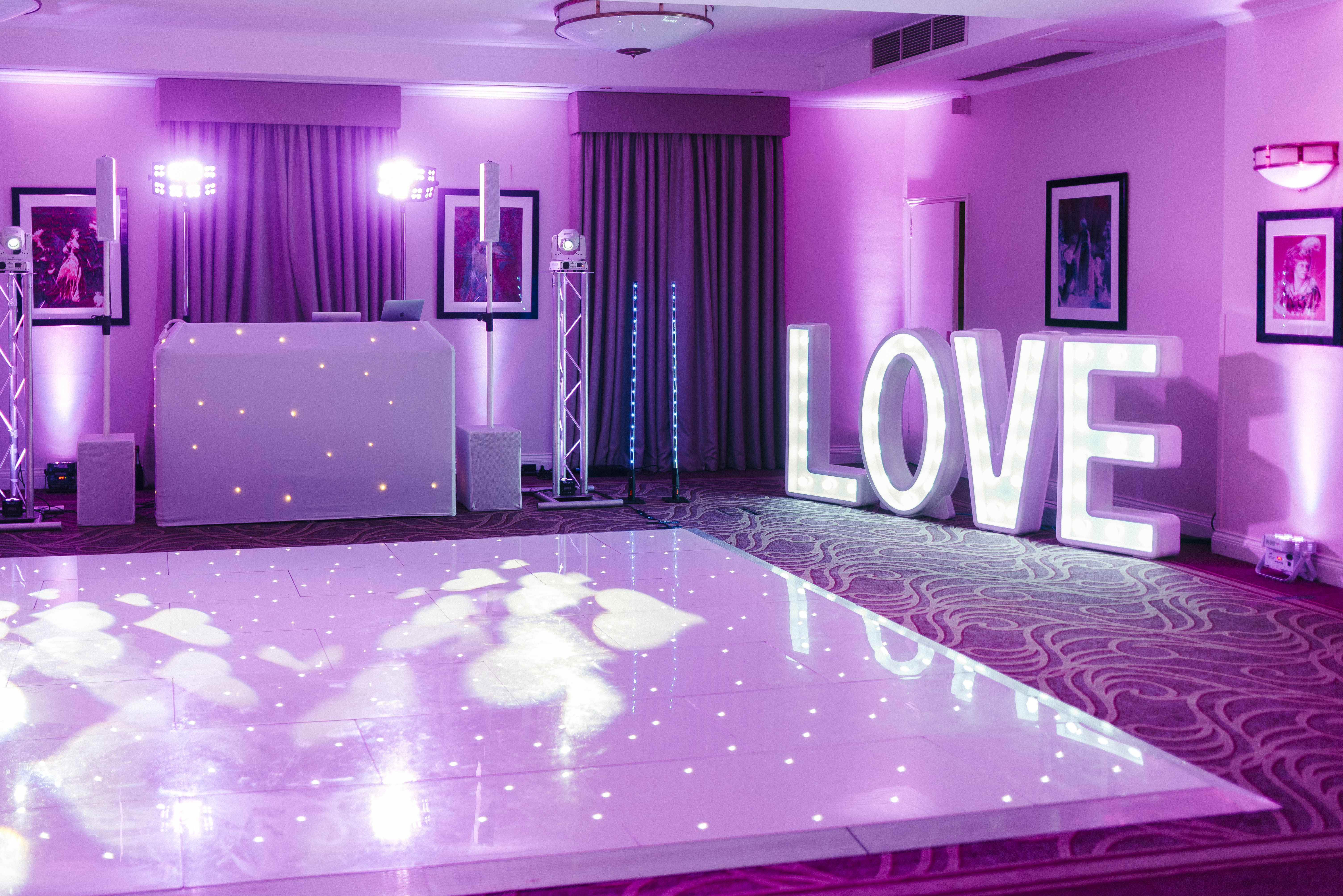 York Suite at Oatlands Park Hotel, featuring a glowing dance floor for weddings.