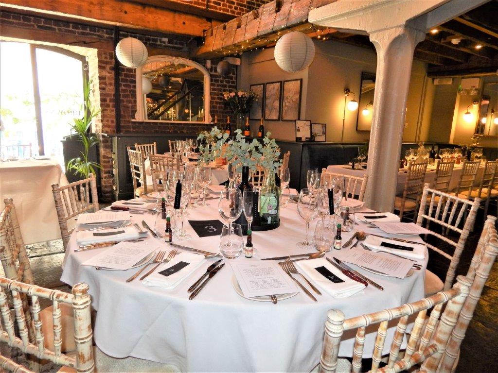 Elegant dining table at Cellar Bar, perfect for upscale events and corporate gatherings.