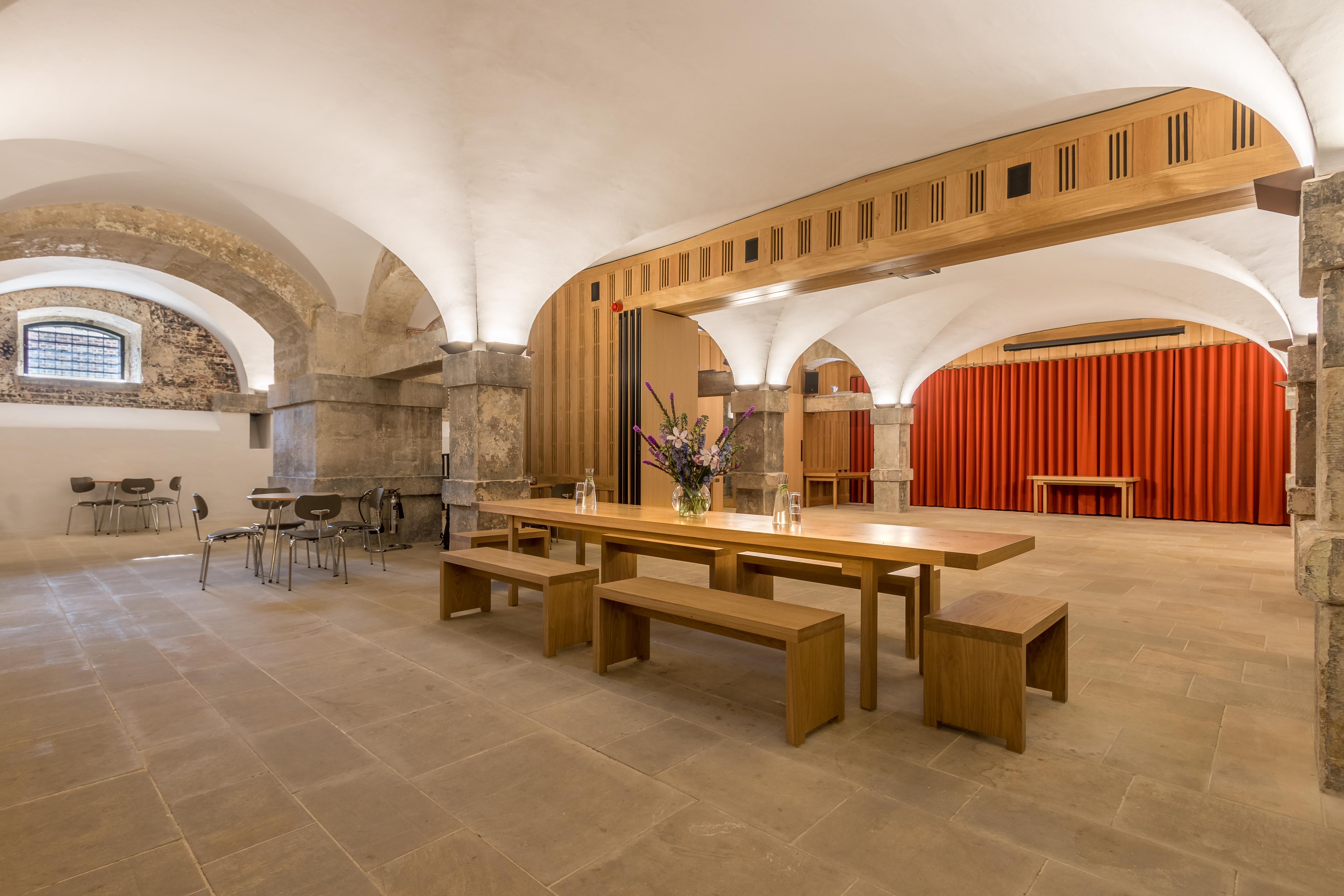 The Crypt at Christ Church Spitalfields: rustic event space with arched ceilings, ideal for gatherings.