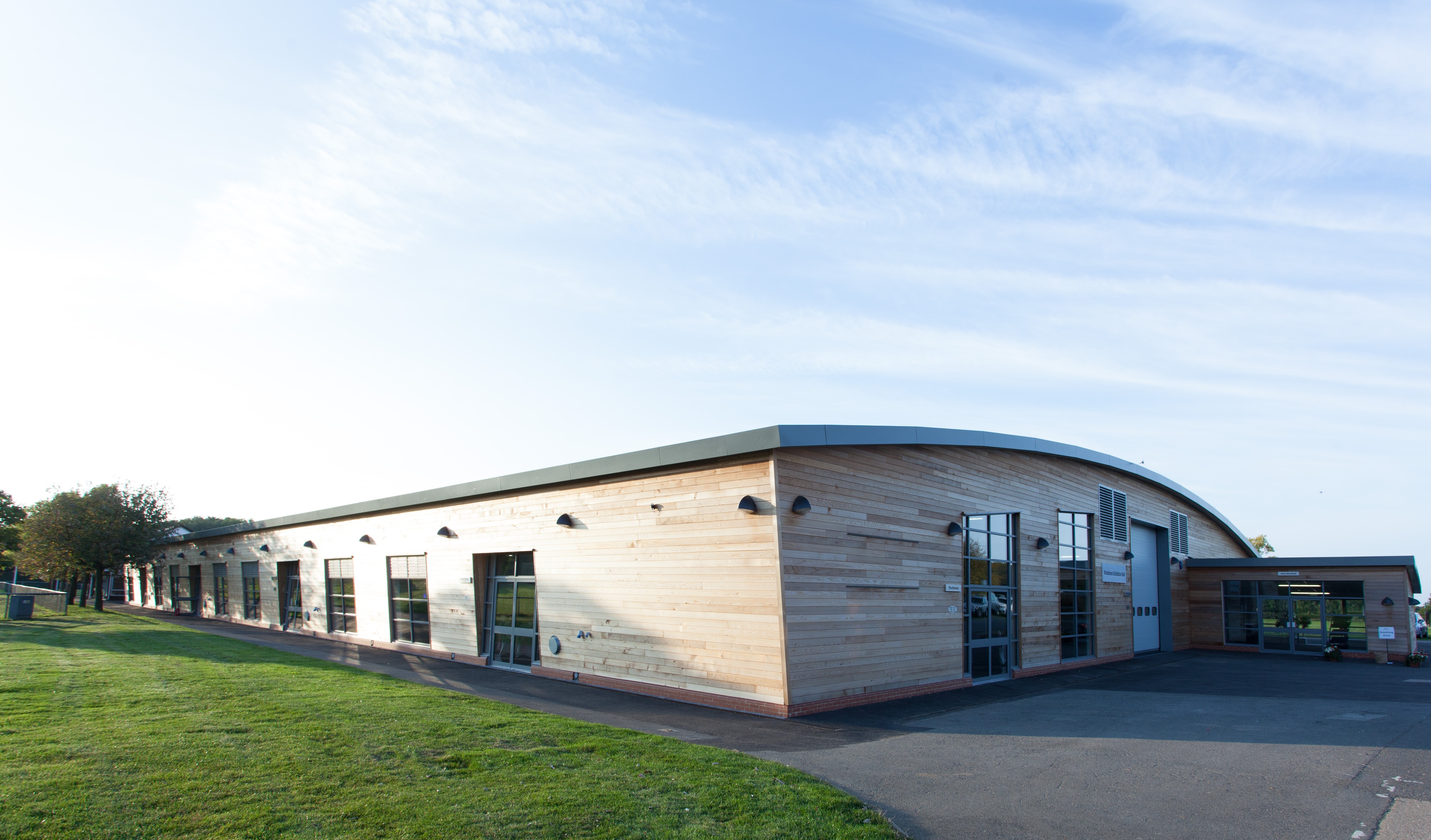 Maidstone Exhibition Hall: modern venue with wooden exterior for events and meetings.
