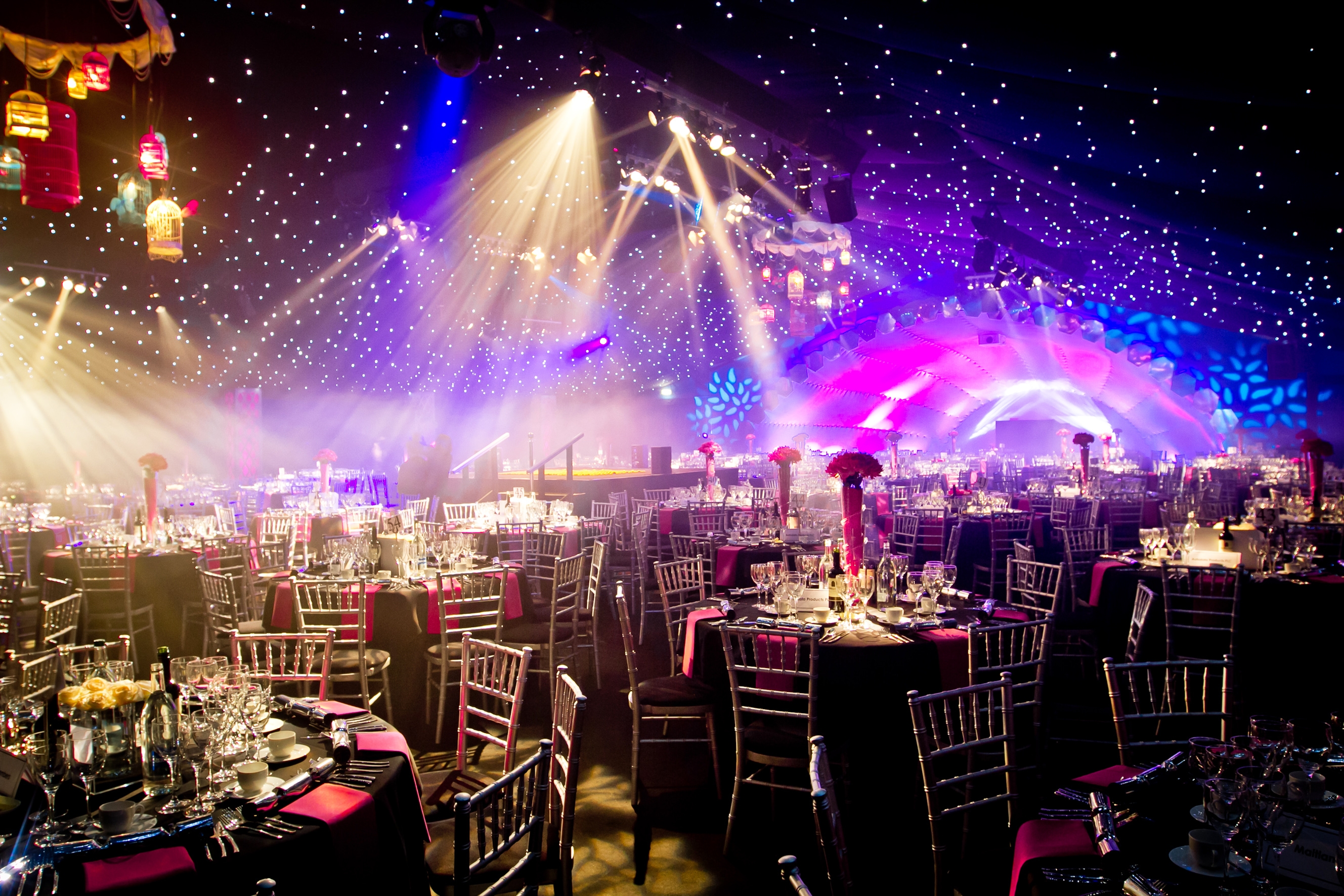 Elegant gala setup in The Artillery Garden with black and pink accents, perfect for events.