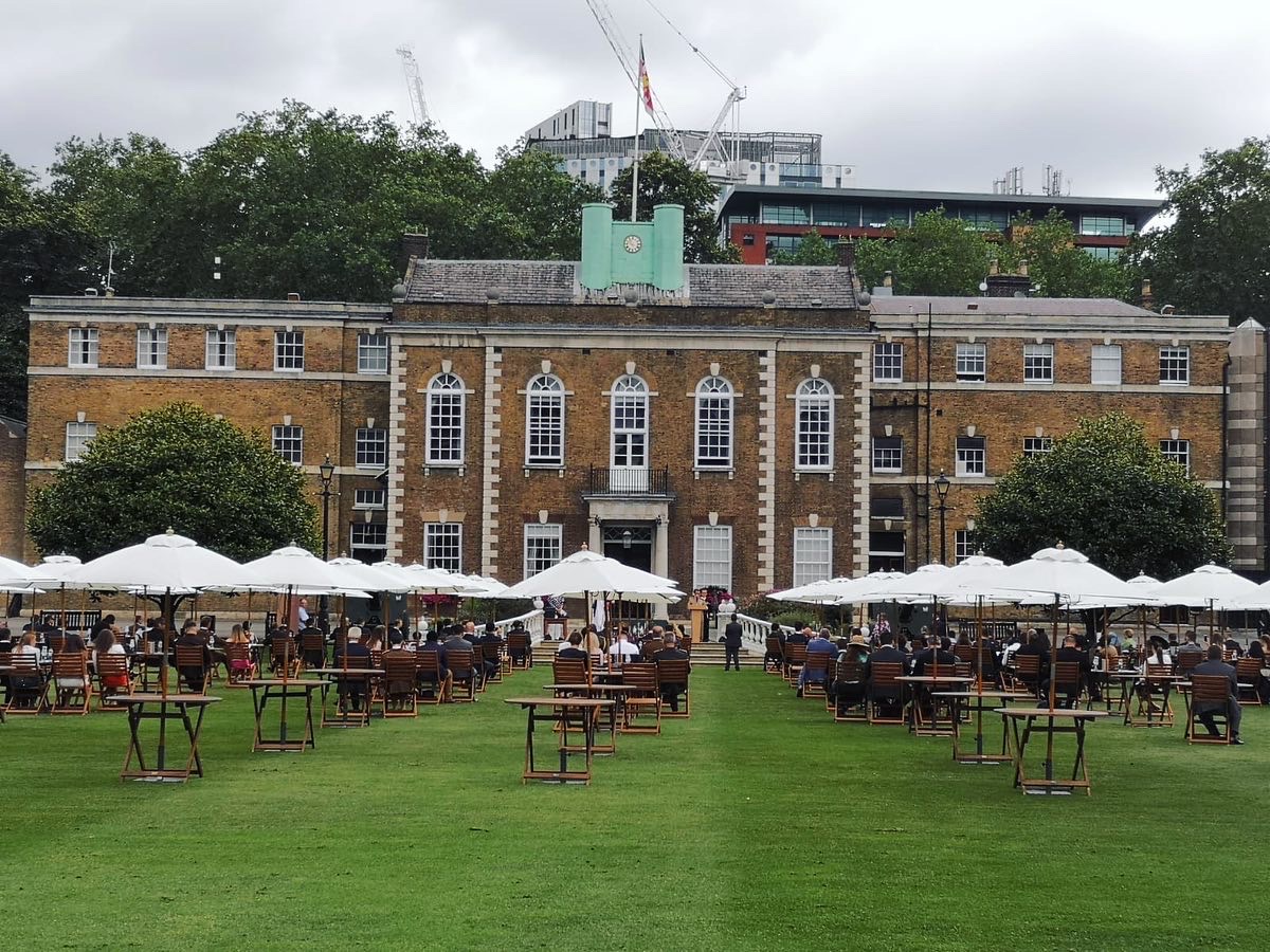 Artillery Garden at HAC, picnic seating under umbrellas for events and gatherings.