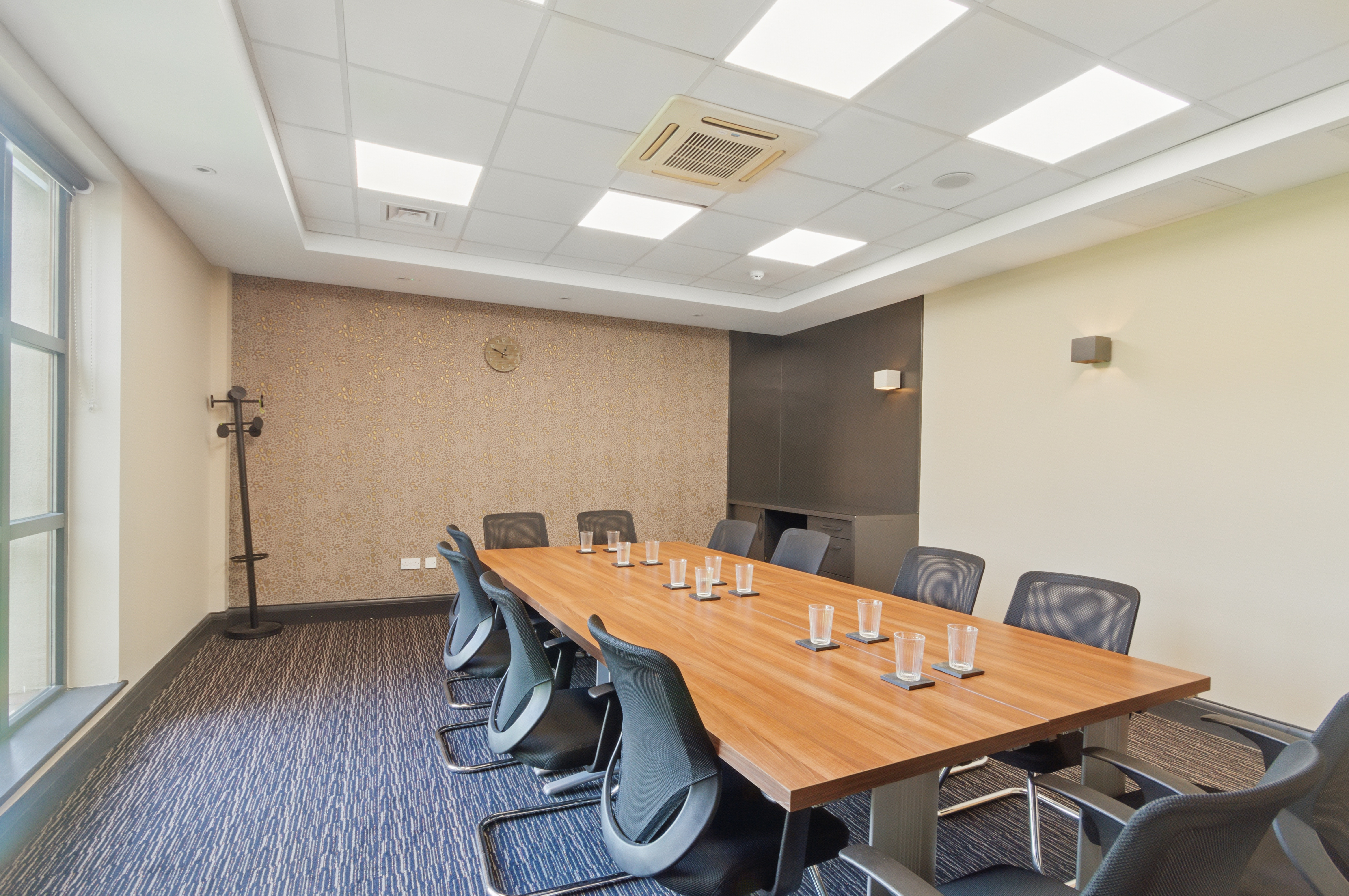 Modern meeting room at Chessington Resort, featuring ergonomic chairs for workshops.