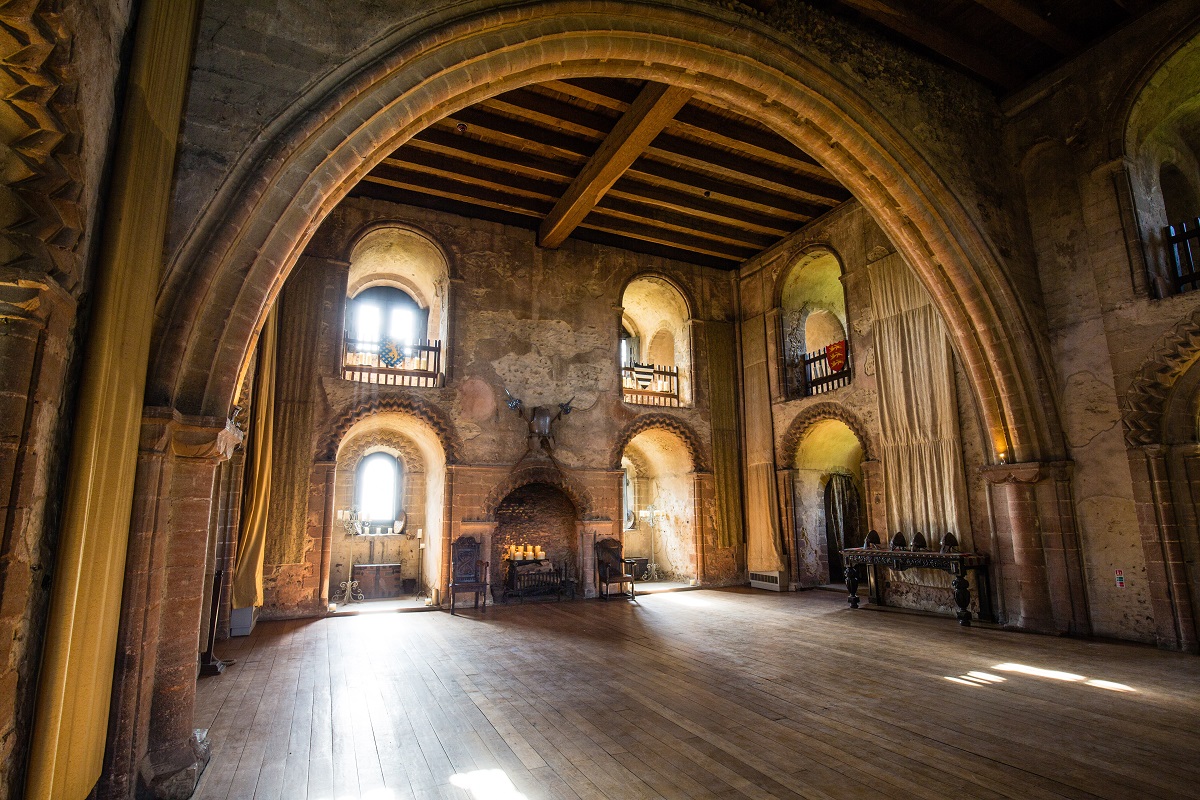 Banqueting Floor at Hedingham Castle, featuring grand arches for elegant events.