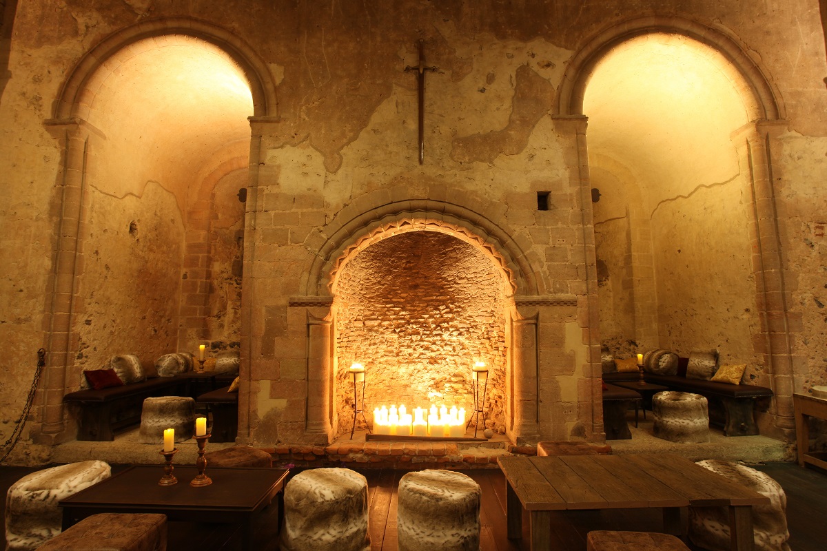 Garrison Floor at Hedingham Castle: rustic venue with stone walls for intimate events.