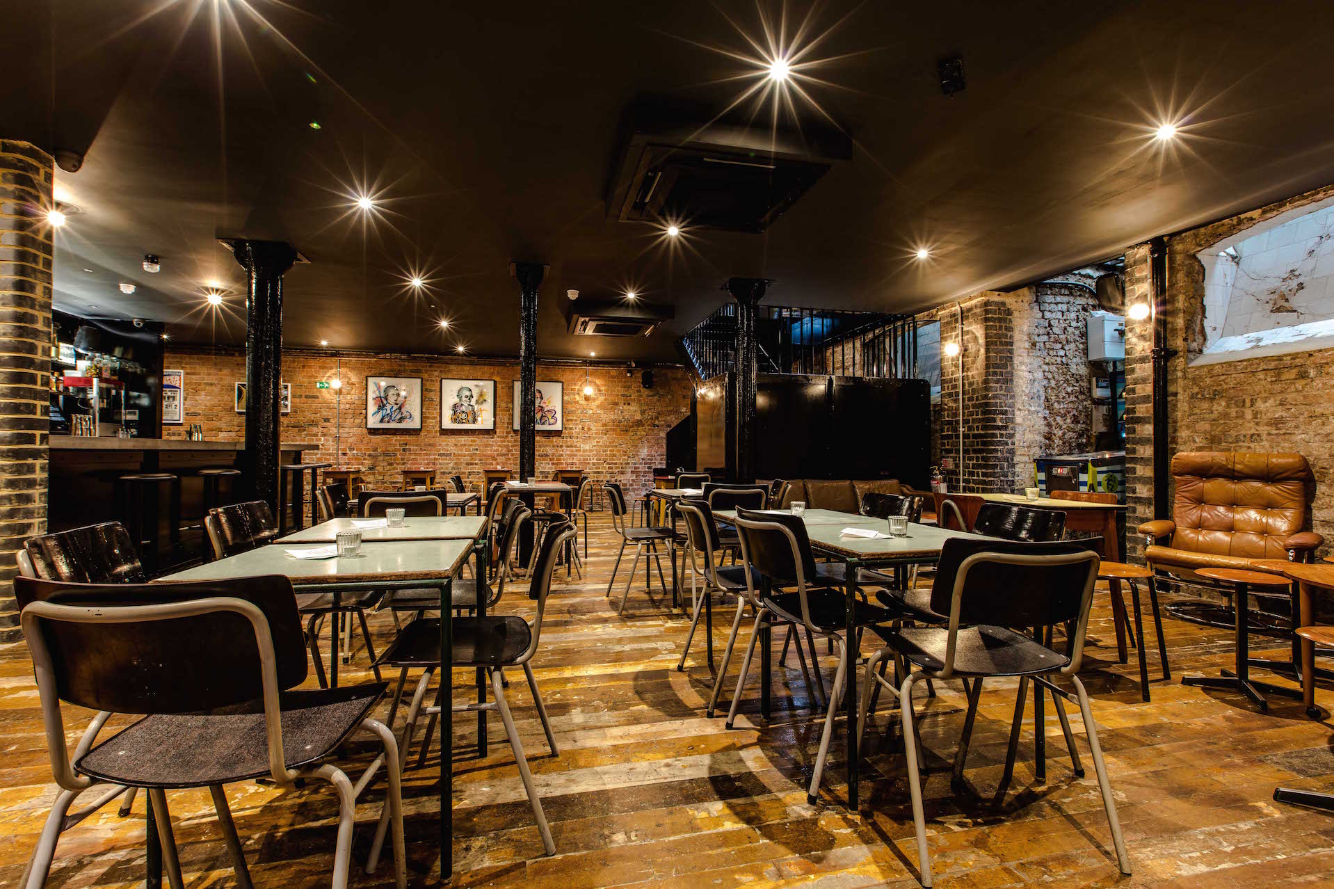 Basement Bar in Coin Laundry: rustic event space with exposed brick for gatherings.