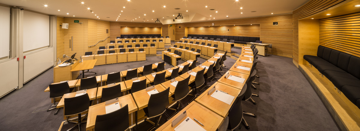 Rhodes Trust Lecture Theatre with tiered seating for conferences and workshops at Oxford.