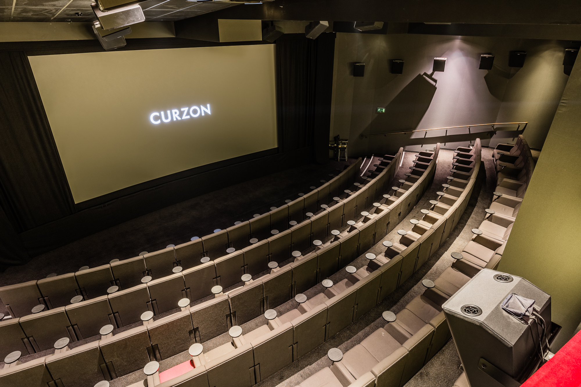 Modern cinema Screen Five - Renoir with tiered seating for film screenings and events.