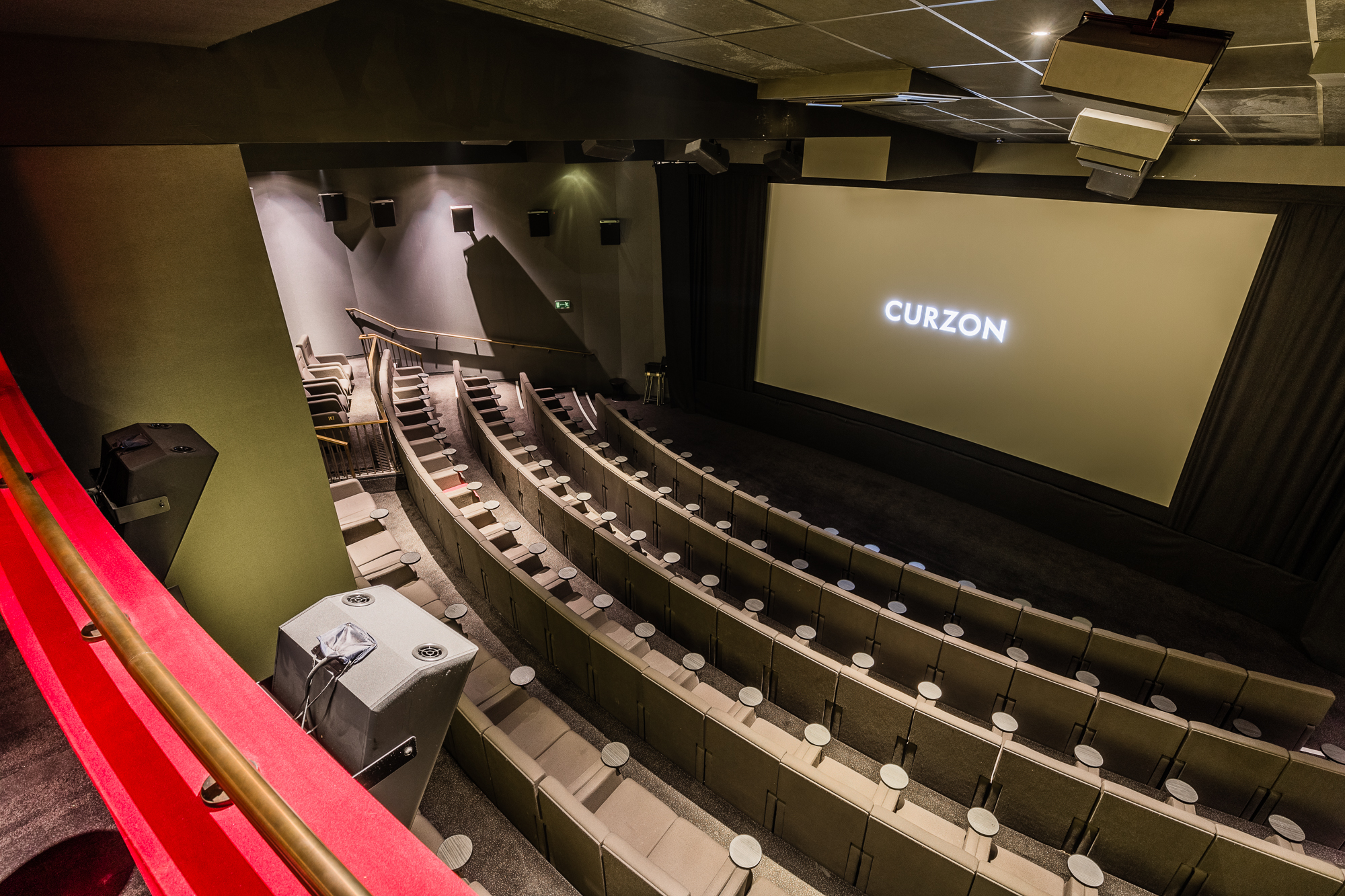 Modern tiered cinema with sleek seating for film festivals and corporate events.