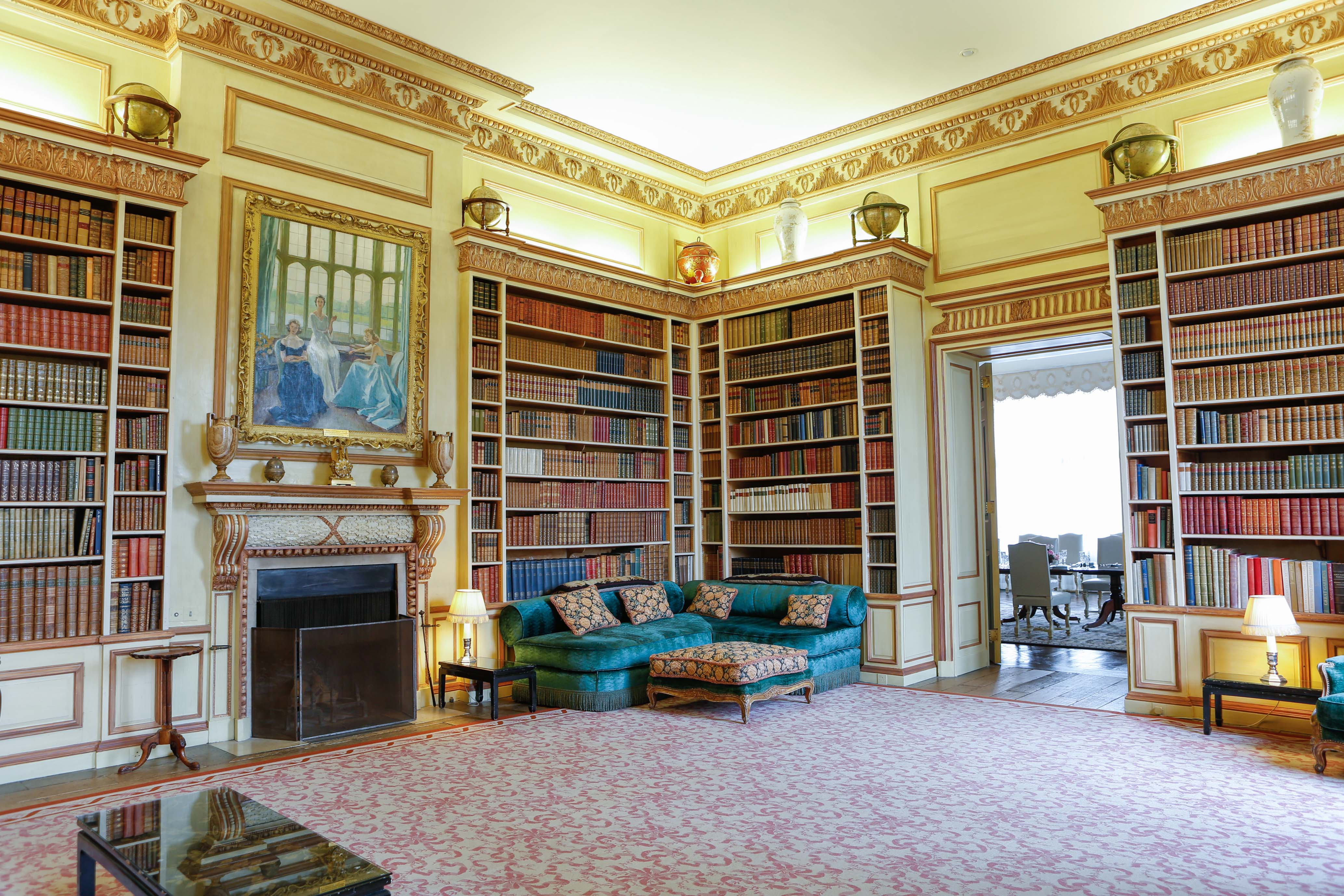 Elegant dining room at Leeds Castle, featuring rich wood paneling for intimate events.
