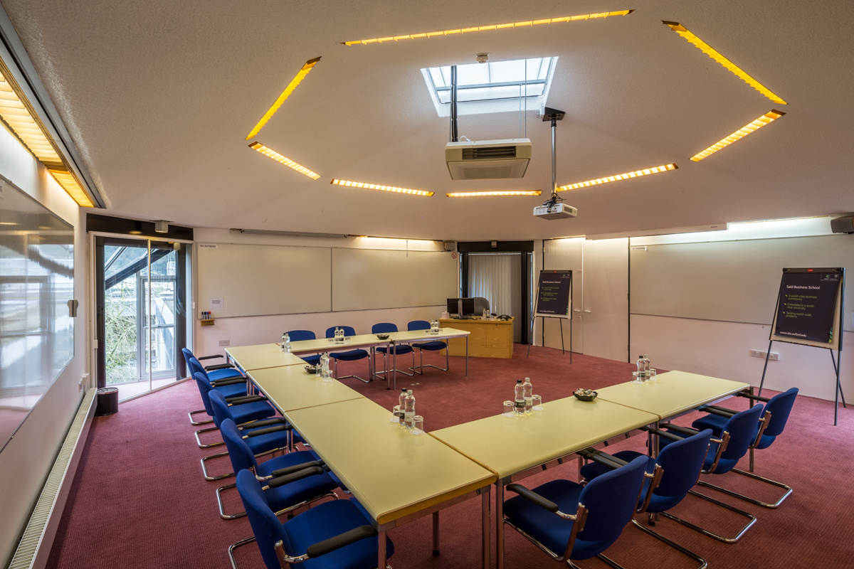 East Lecture Room at Egrove Park, U-shaped table for corporate meetings and workshops.