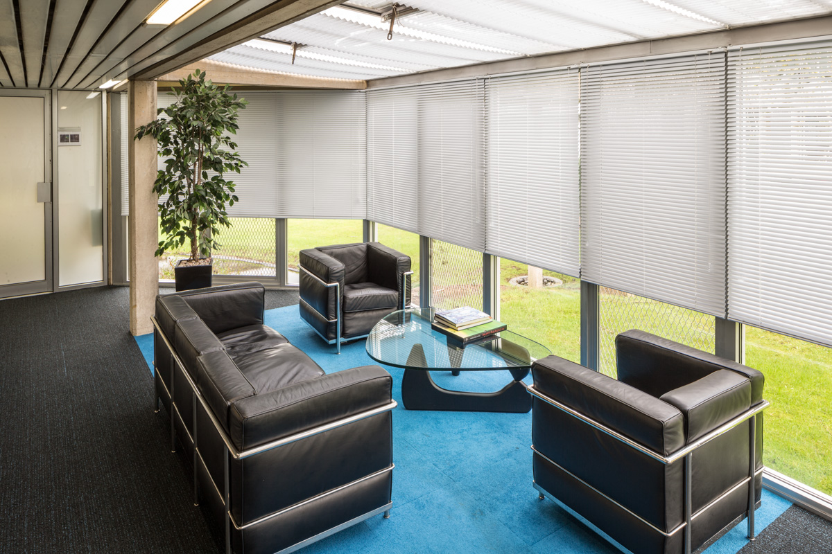 East Lecture Room at Egrove Park, modern lounge for networking and meetings.