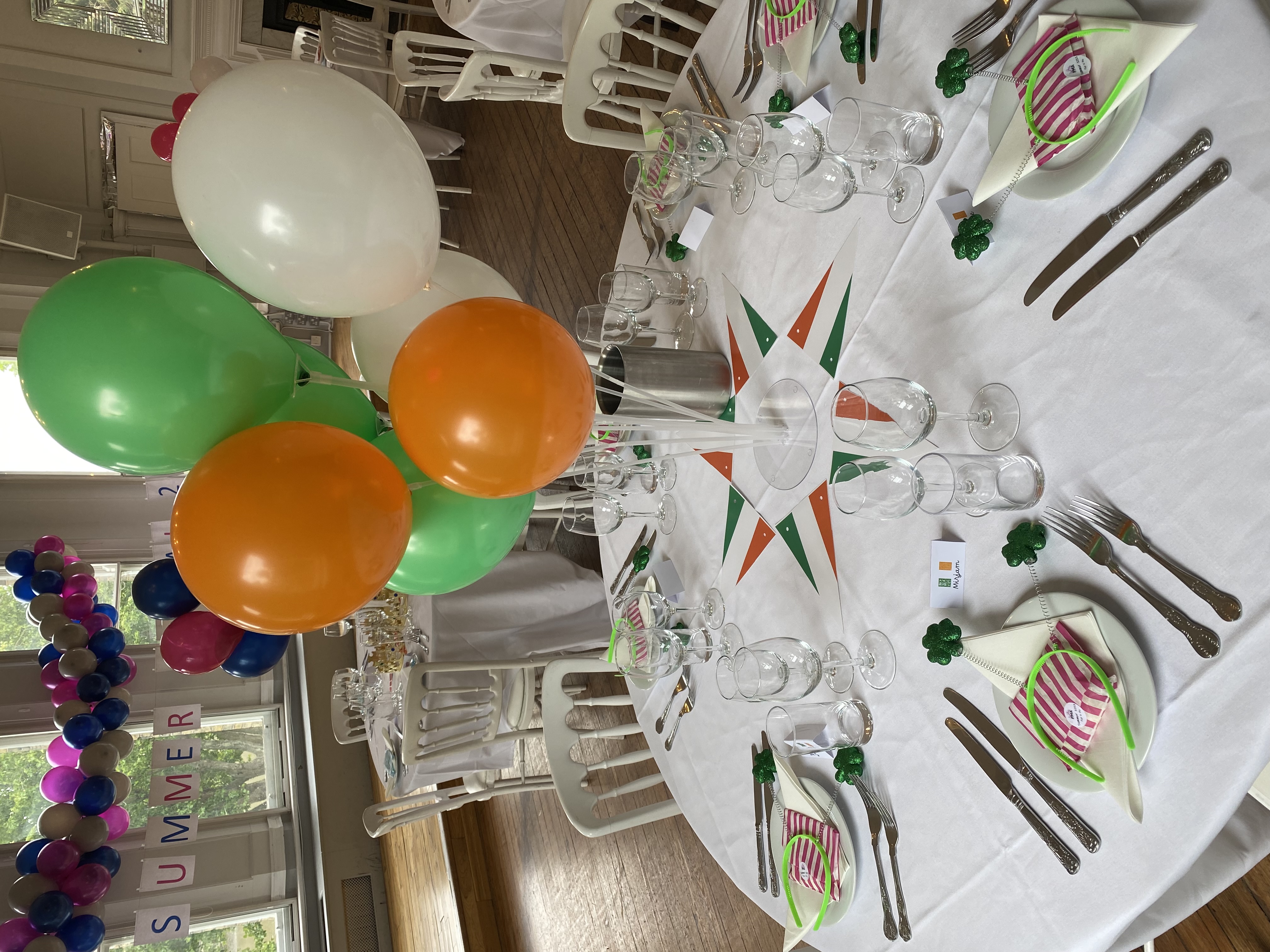 Event space in Winchester House with vibrant balloon centerpiece for parties and corporate events.