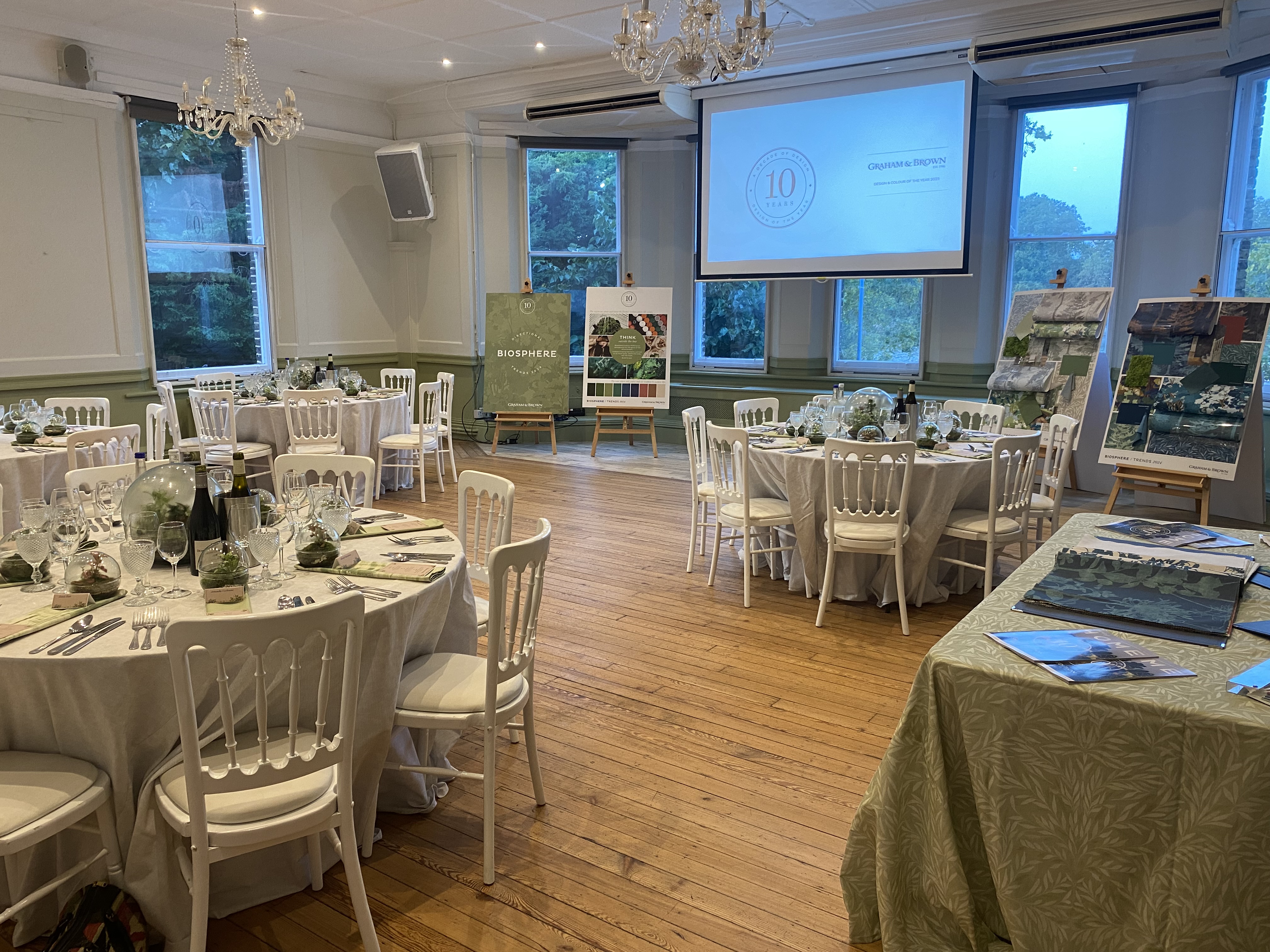 Elegant event space in Winchester House with floral centerpieces, perfect for meetings and celebrations.