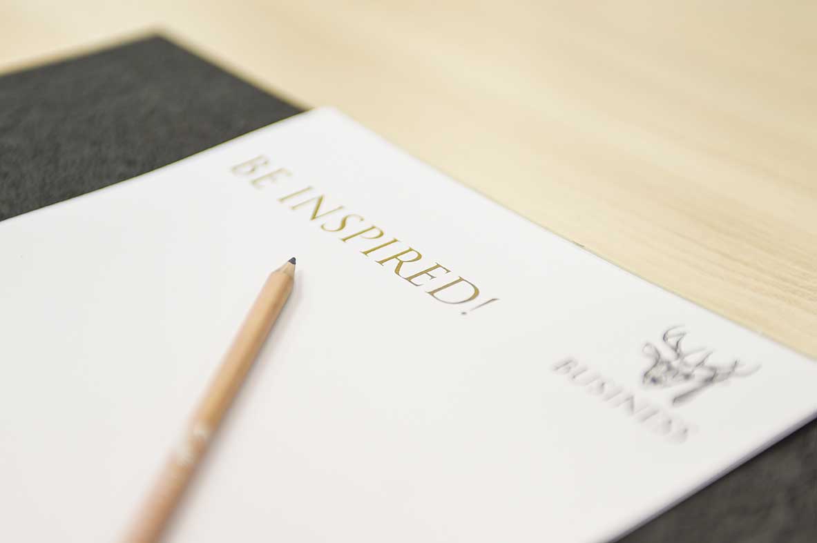 Kingston Suite at The Oakley Court with "BE INSPIRED!" notepad for workshops and meetings.